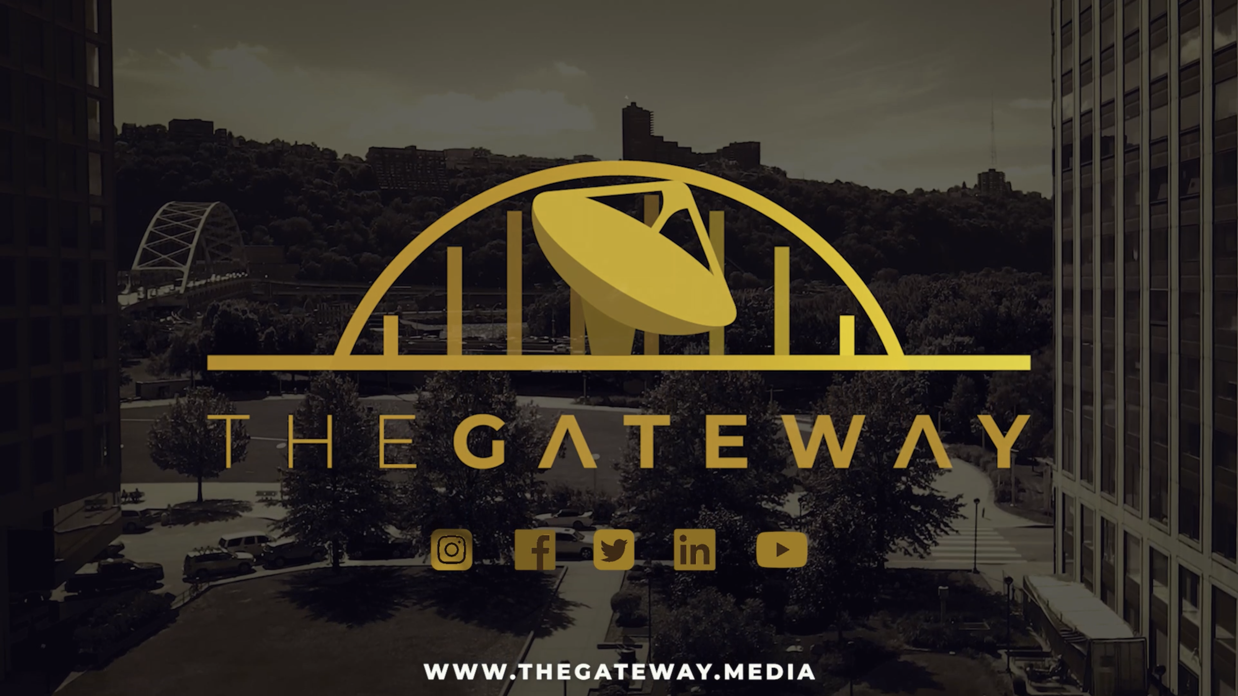 TheGateway Logo dark gold with city SCREENSHOT.png