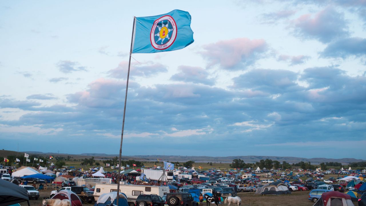 A camp in Cannonball, North Dakota, where the Standing Rock community is joined by supporters in defending their treaty rights agains the Dakota Access Pipeline as the reservation flag flies overhead.
