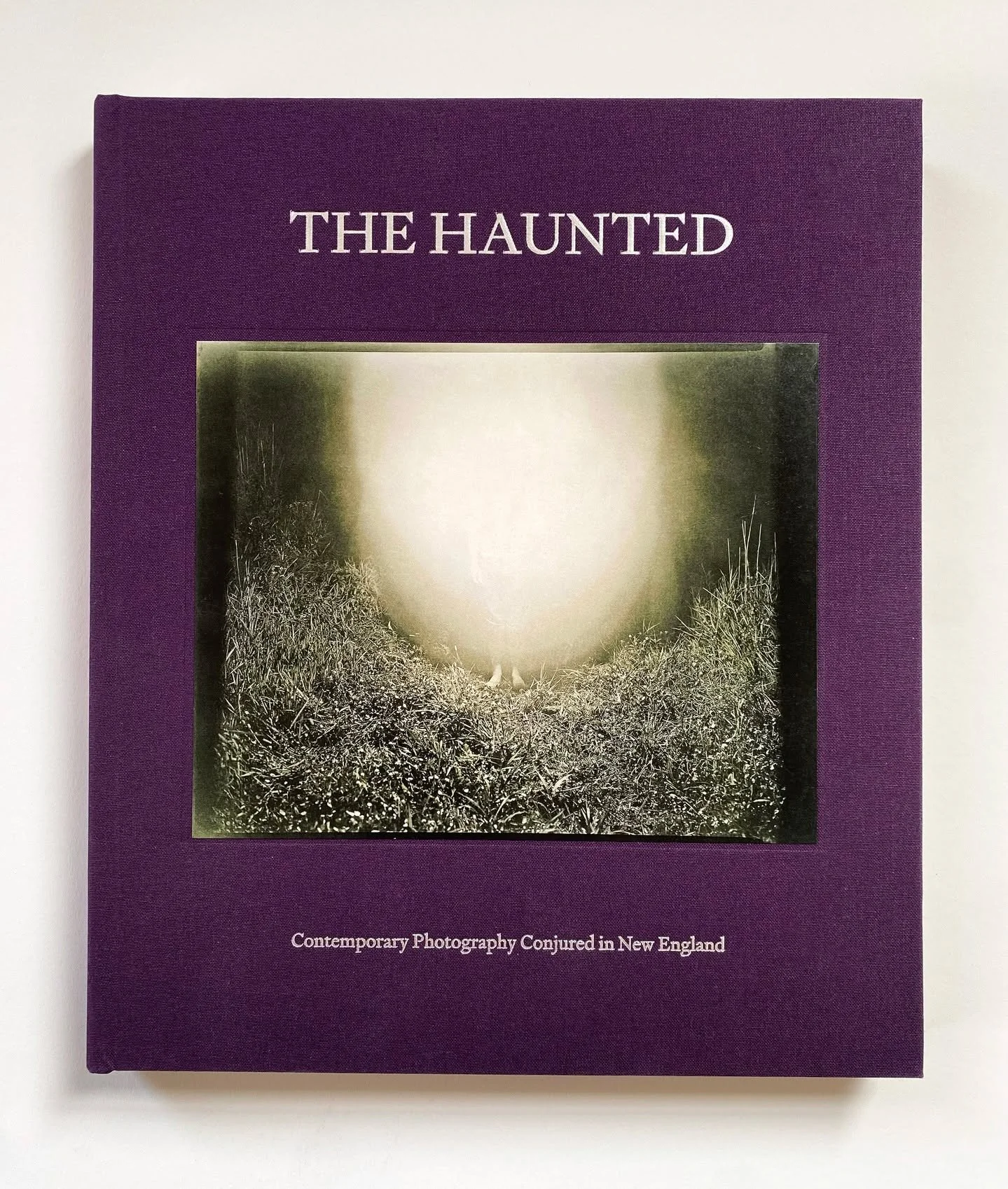 THE HAUNTED has arrived! The hardbound linen cover looks beautiful with the inset photo by Peter Shellenberger. 

You can order them through the link in our bio, limited copies available. Orders will begin to ship out next week! Thank you to @emilysh