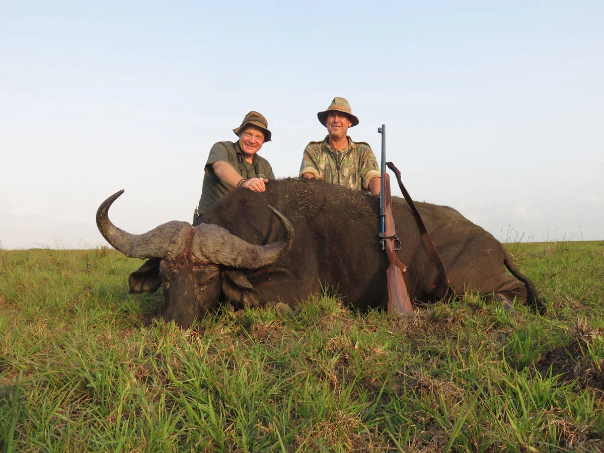 Boddington and PH Mark Haldane with a Mozambique buffalo taken in 2016 with a .416 Rigby and a single Swift A-Frame. The .416 Rigby is just one of 12 large-caliber offerings in Swift High Grade’s Dangerous Game line.