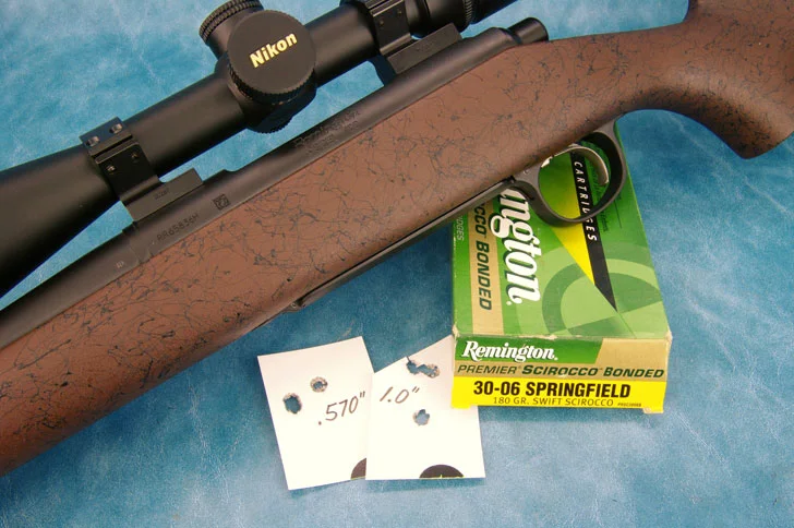 Shown here are the best and worst of the five 3-shot groups fired from benchrest at 100 yards with Remington’s 180 grain Swift Scirocco load. The 15-shot average was .670”.