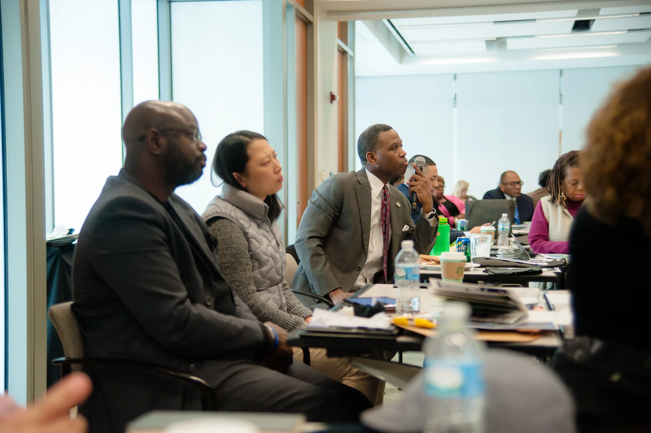 2018 Community-Up CRA Conference. Attendees listen intently to panel speakers