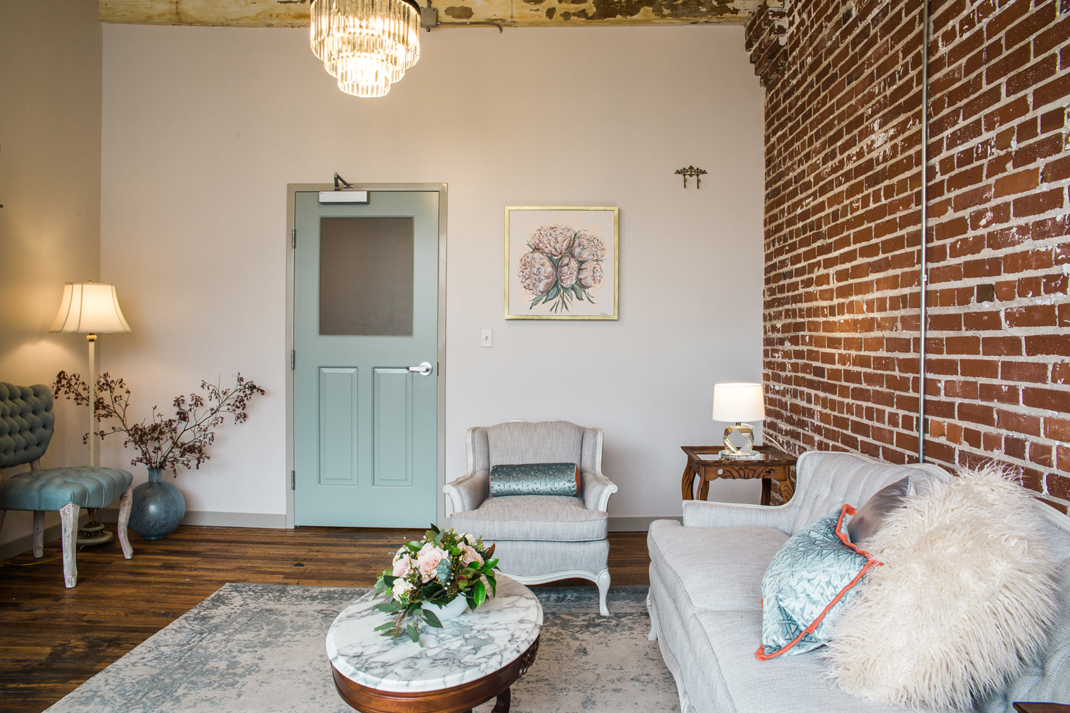 Women's Lounge. Art by Erika Roberts , with a beautiful hook beside to hang a wedding dress!
