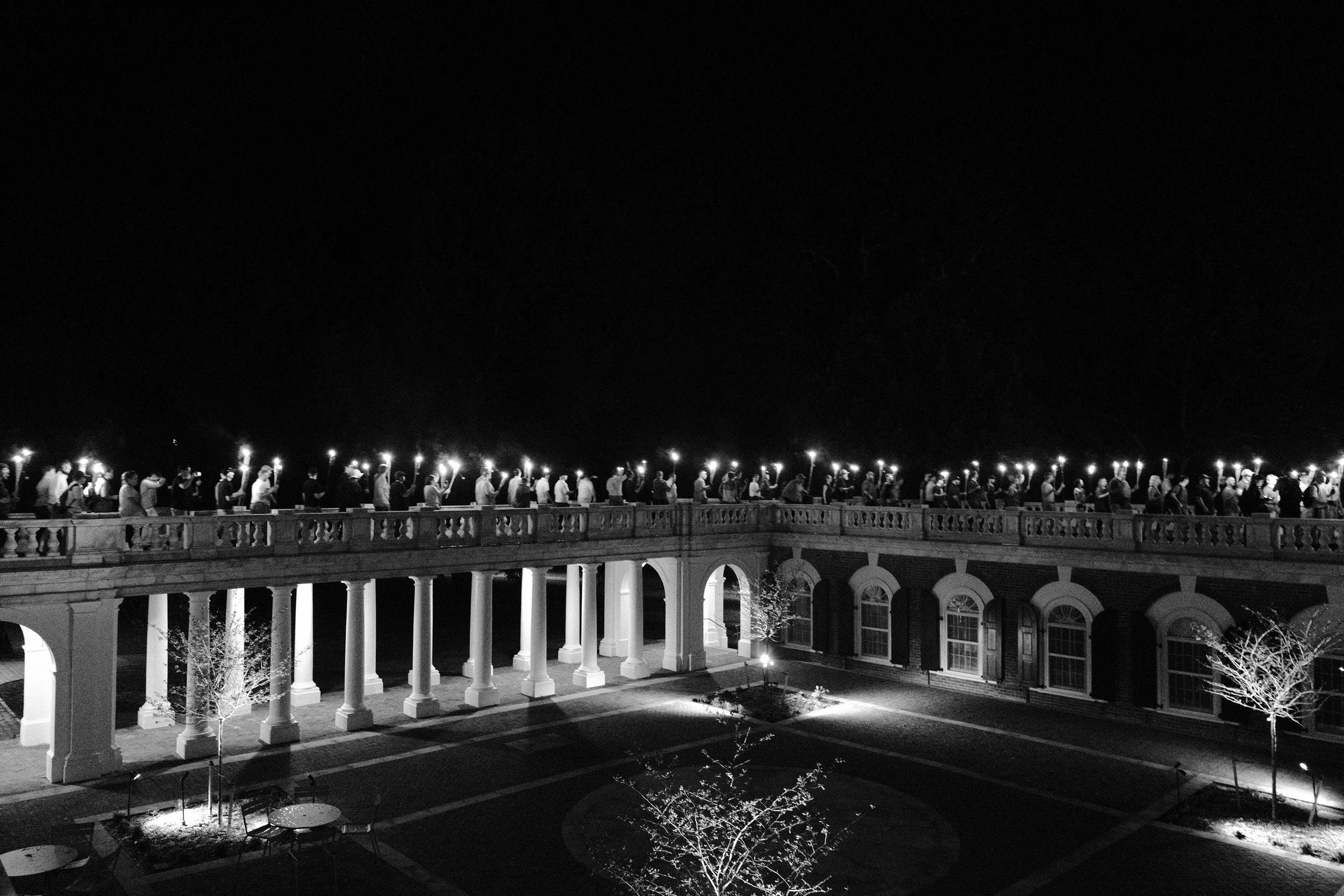 The procession continued through UVA campus yelling "Blood and Soil!", a Nazi slogan, and "You will not replace us!", a refrain originating from the European Identitarian movement. While a couple of police officers were present at the outskirts of the march, they did not intervene as journalists and photographers were threatened or assaulted.