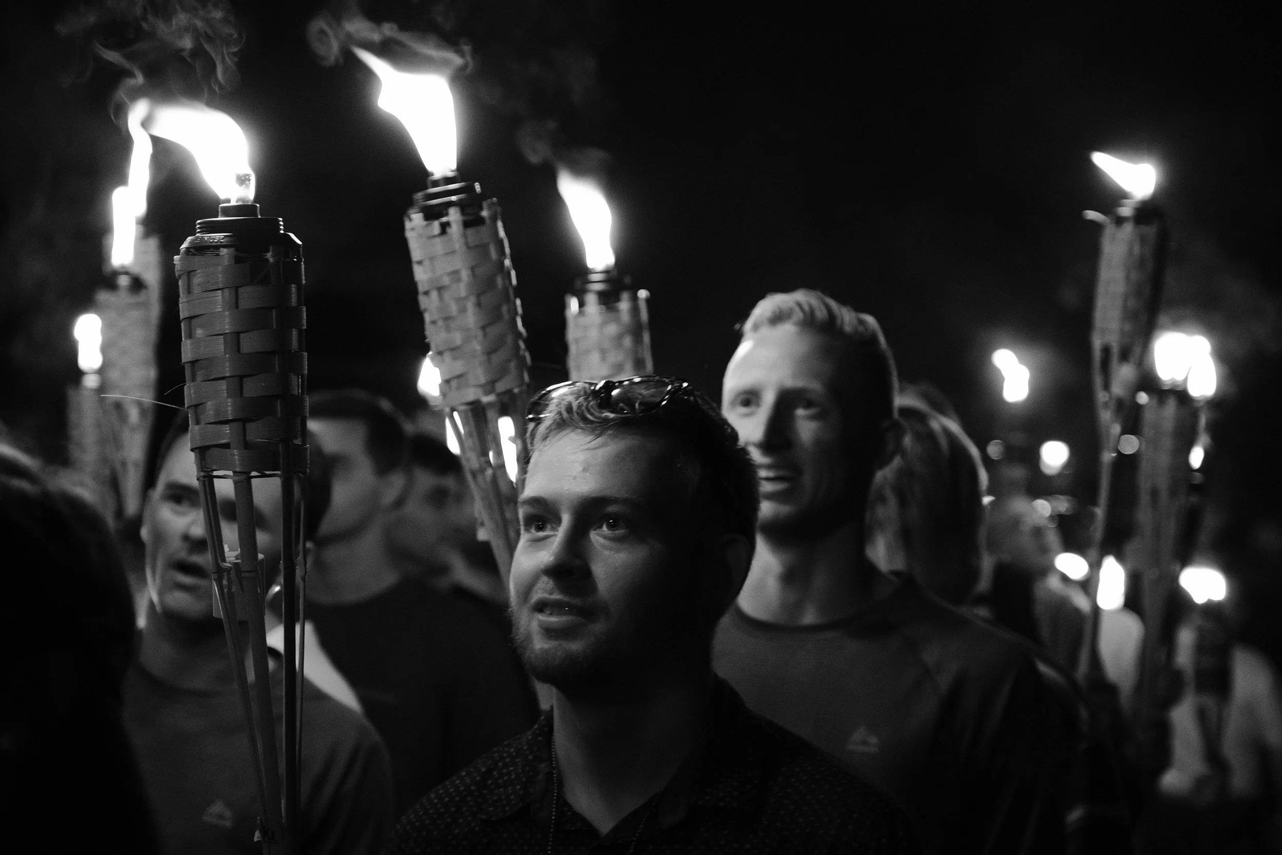 Charlottesville's troubles began on the evening of Friday, August 11th when packs of white supremacists from across the country began gathering at Nameless Field on the University of Virginia campus. Students playing volleyball in a nearby court evacuated as the marchers multiplied. After the group grew to its ultimate size of approximately 400, they established security teams and ignited their torches. Media jostled for position and a drone buzzed overhead as the marchers reveled in their numbers. Among the crowd were Ben Daley and Tom Gillen, members of the Rise Above Movement (RAM), a group of street-brawling white supremacists based in California.