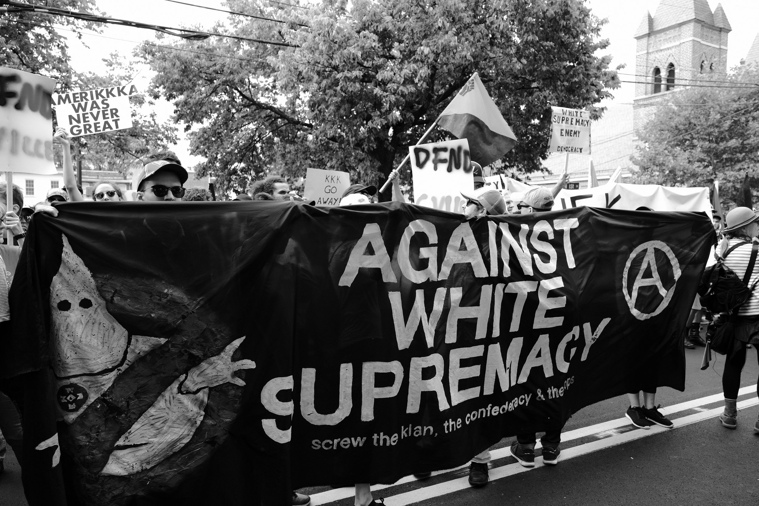  The protesters started the day as mostly clergy, holding hands and singing songs, but grew steadily as antifascists, union members, angry citizens, and others came to show the white supremacists they weren't welcome in Charlottesville. 