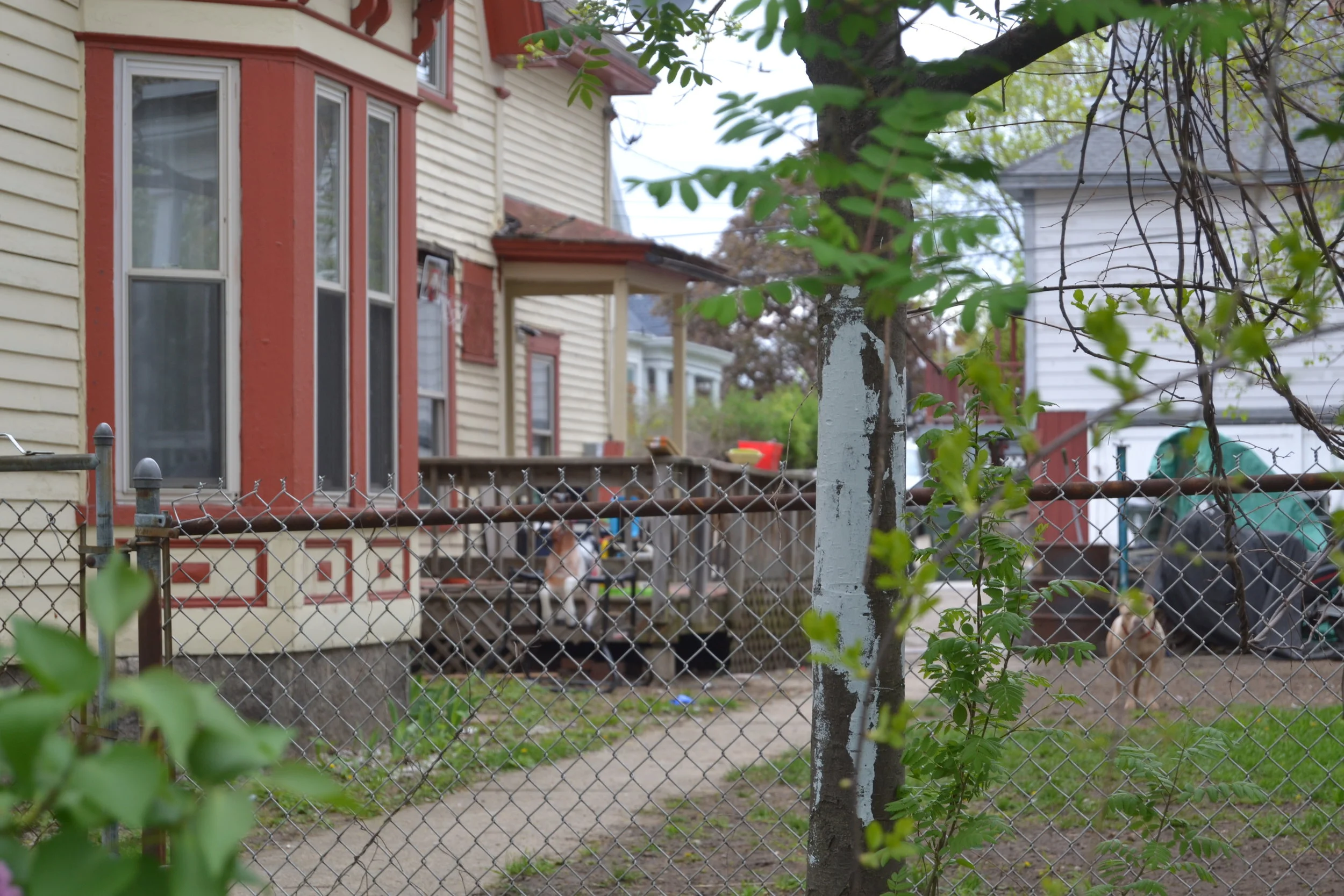 A side-view of the same house that firefighters suspect is operating as a "recovery house." CREDIT PAIGE SUTHERLAND/NHPR