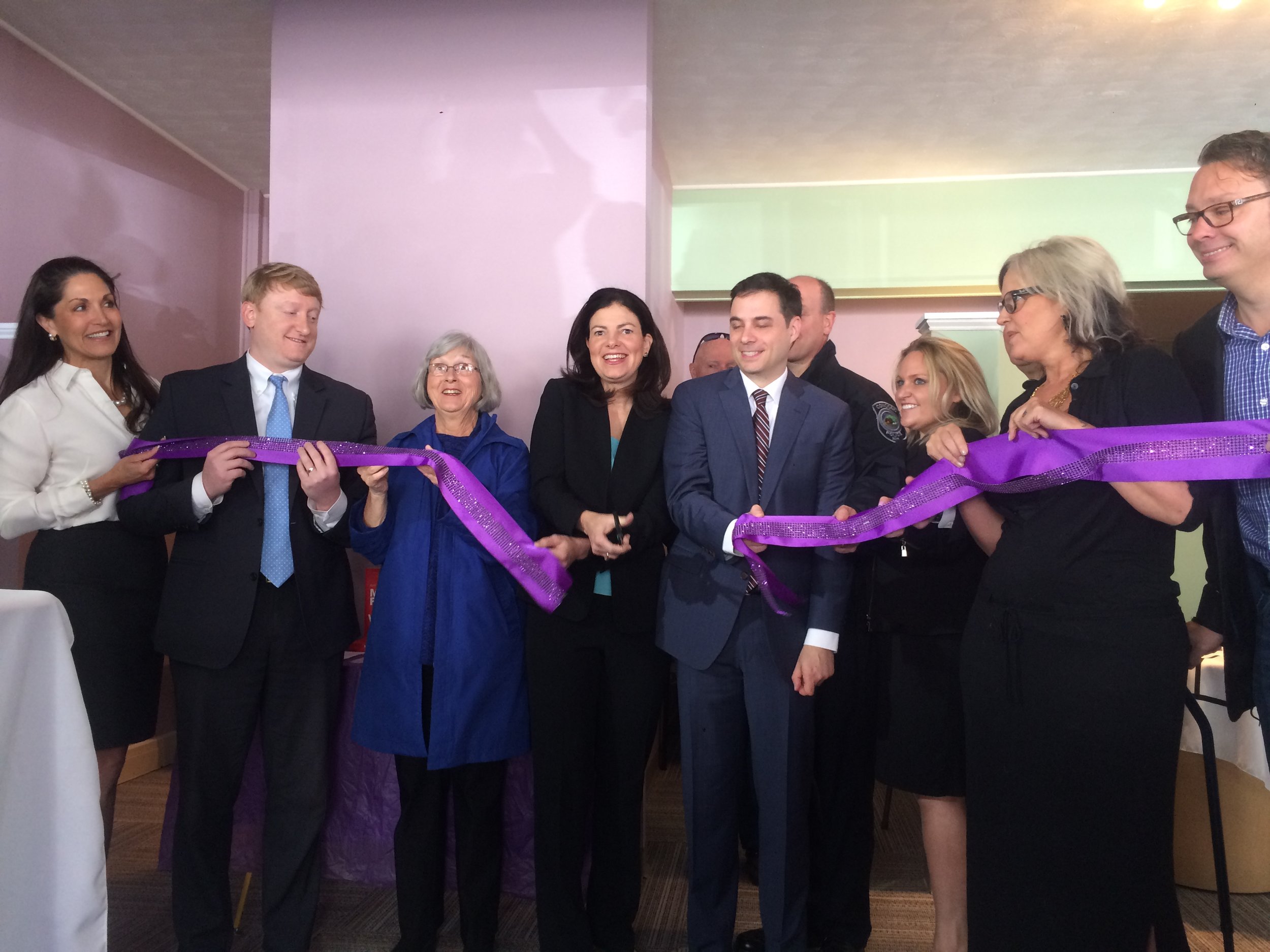 Former U.S. Senator Kelly Ayotte (center), State Senator Dan Feltes (left) and the former state Drug Czar attended the Concord Center's ribbon cutting last May. CREDIT PAIGE SUTHERLAND/NHPR