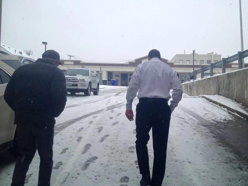 The Manchester Fire Chief walking a Bow resident over to the substance abuse treatment facility Serenity Place as part of Safe Station. By Paige Sutherland/NHPR