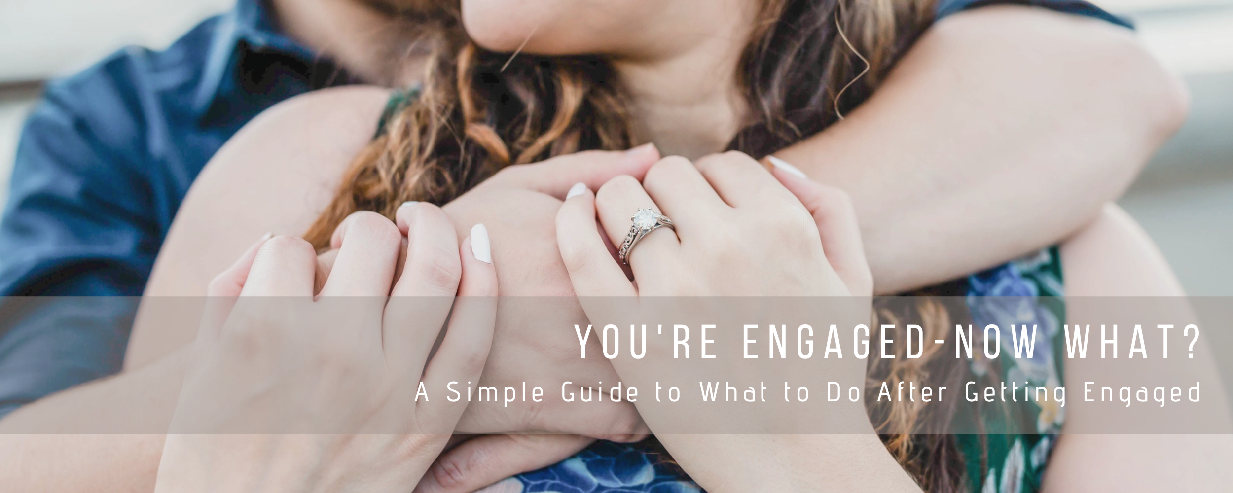 Arms of a male and female couple crossed in a hug showinf the female's engagement ring with a text banner reading "We're Engaged, Now What? 3 Things Engaged Couples Getting Married Should Do First"