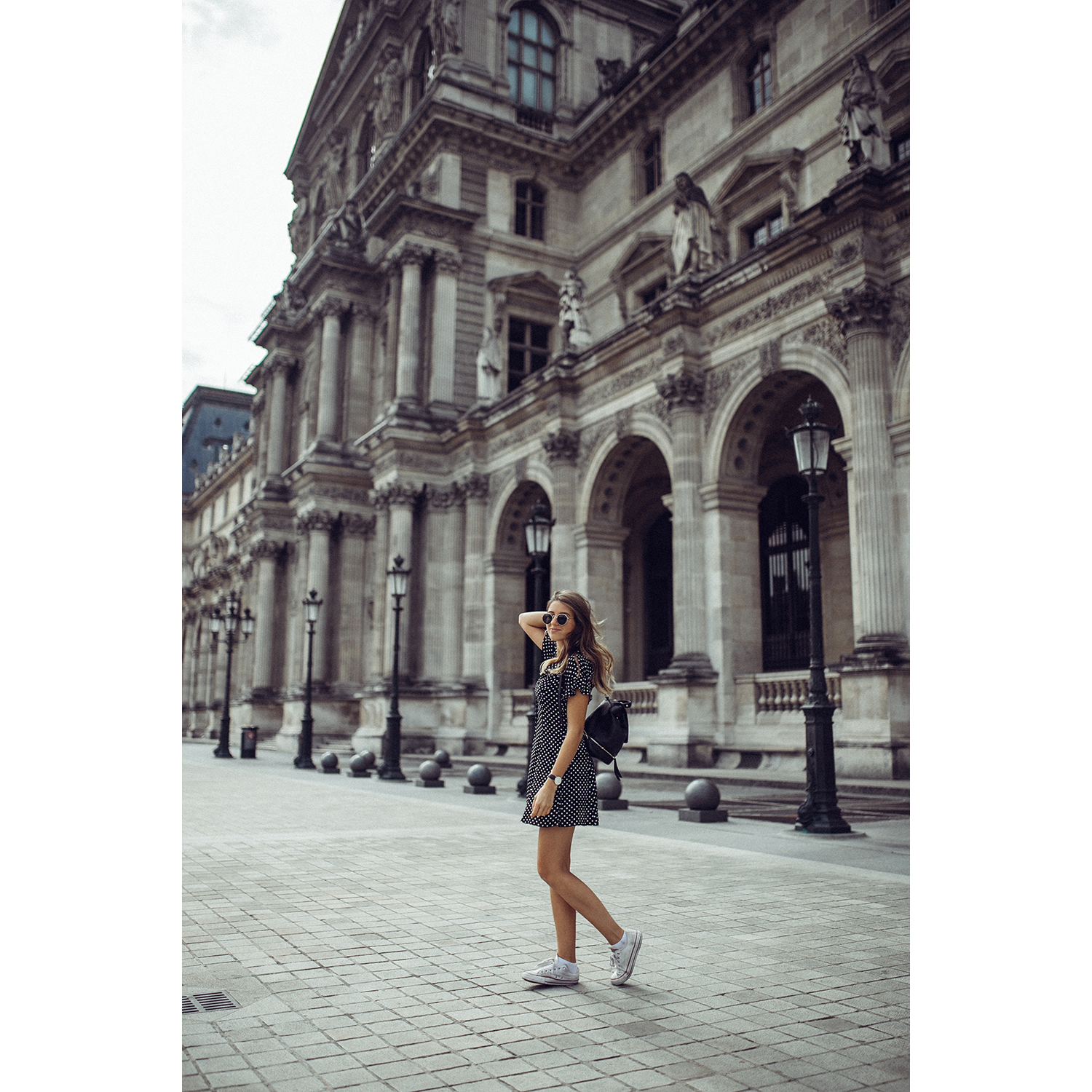 at the louvre, behind the craziness of the glass pyramid