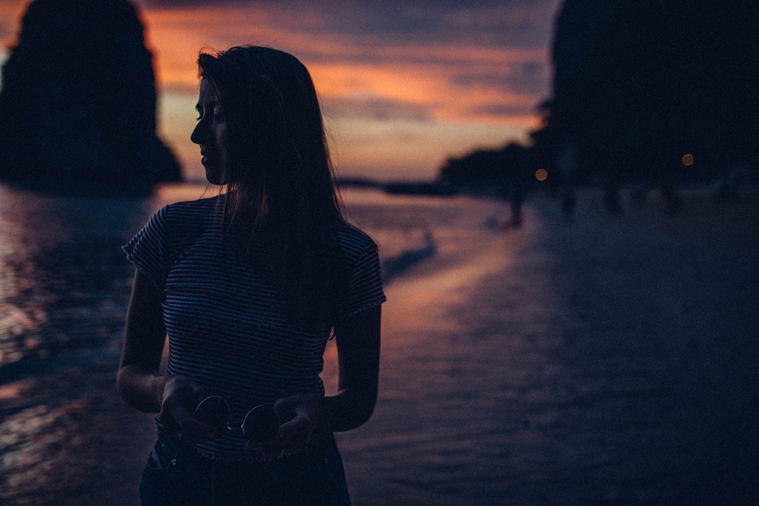 sunset (or rather me kind of covering it) at ao phra nang