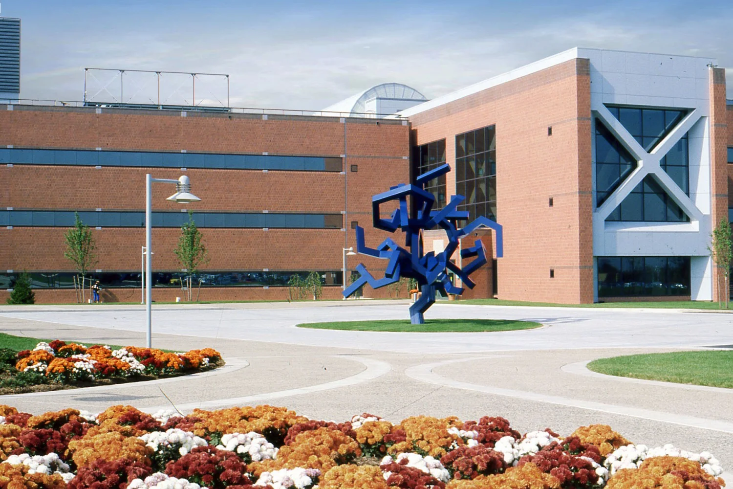 The initial increment, completely constructed, is a 910,000 SF, nine building complex tat contains the consolidated administrative headquarters, commons, R&D laboratories and related support areas. 