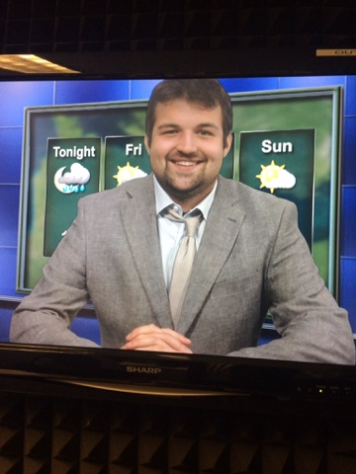 weather desk pic with crocked tie that paula todd fixed.png