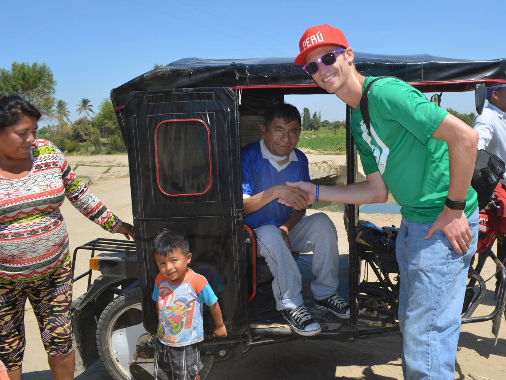 Jacob Niemeier, far right, greets Manuel, center, a Monte Castillo, Peru resident who was diagnosed with parasitic worms after drinking local contaminated water. Manuel is now free of the parasitic worms but still has medical issues as a result of carrying the worms in his body. (VAVV photo)