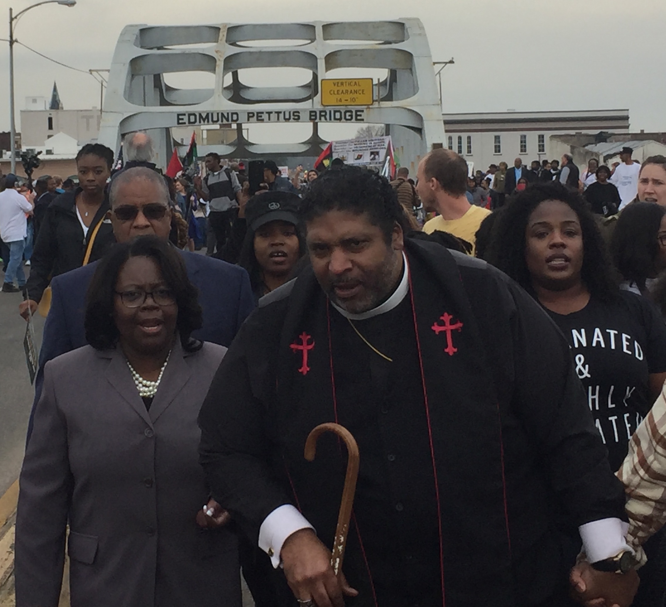  Taking it to the streets: Crossing the infamous Edmund Pettis Bridge in Selma, Ala., last March. 