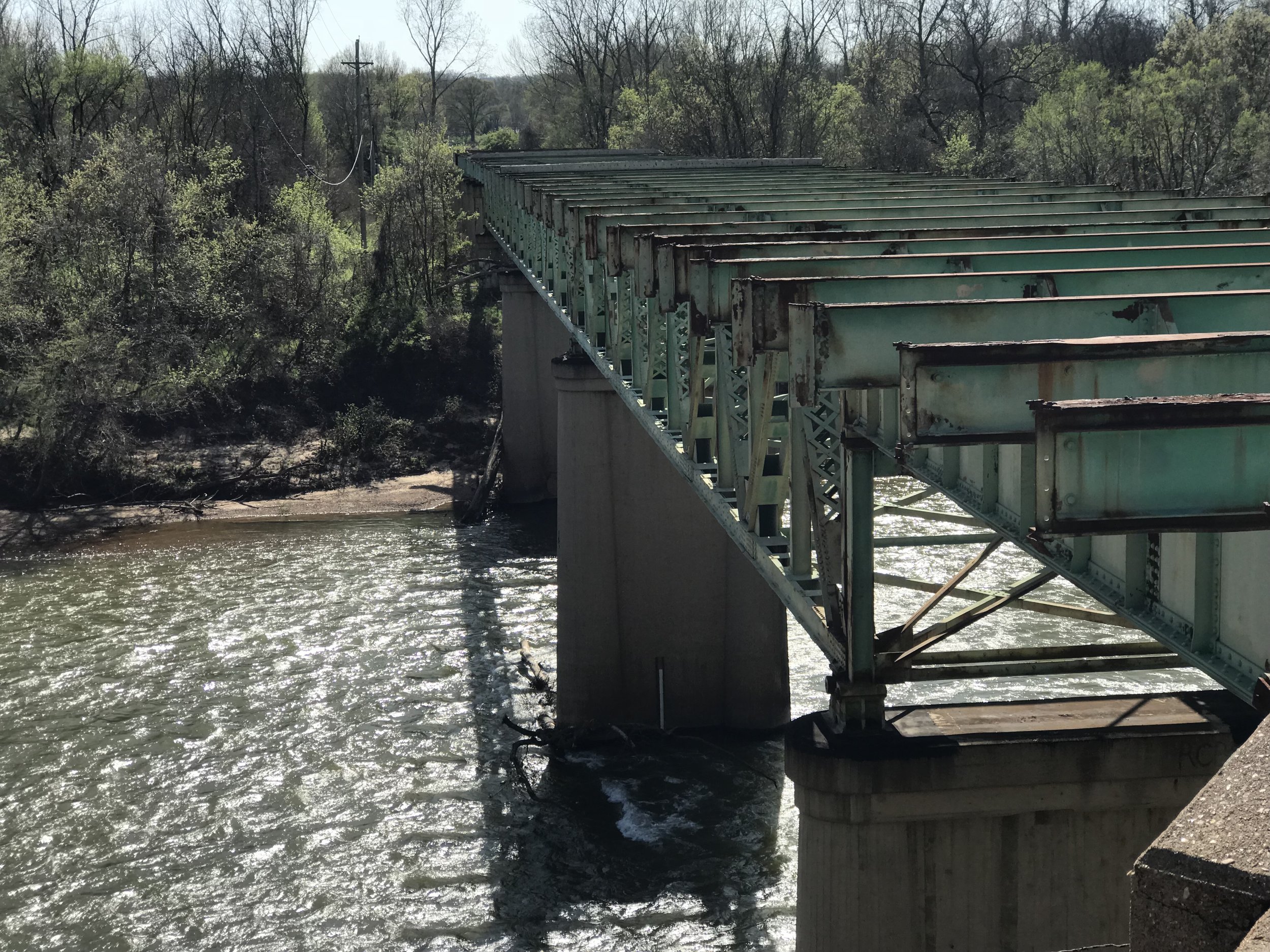 The Route 66 bridge over the Meramec River is a rusted skeleton. On the other end is where the town of Times Beach used to be. 