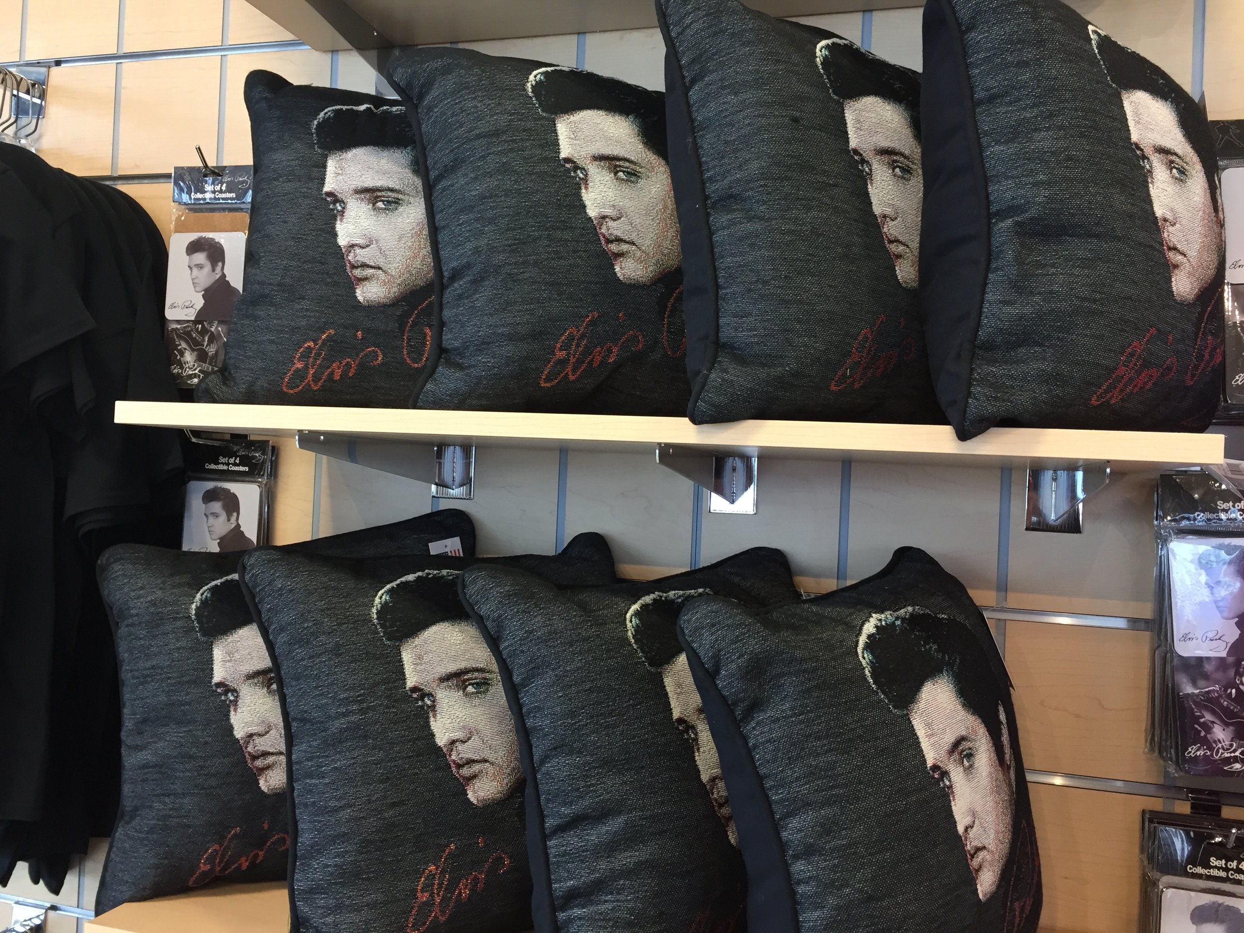  Souvenirs for sale at Graceland include all manner of images of Elvis, including these pillows.      