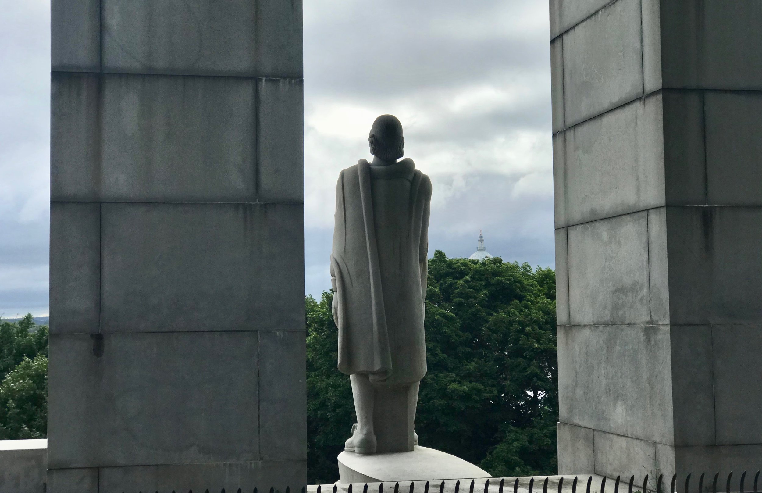  A statue representing Roger Williams (there is no historical description of his appearance) looks out over Providence, R.I., the city he founded as a refuge from religious persecution.      