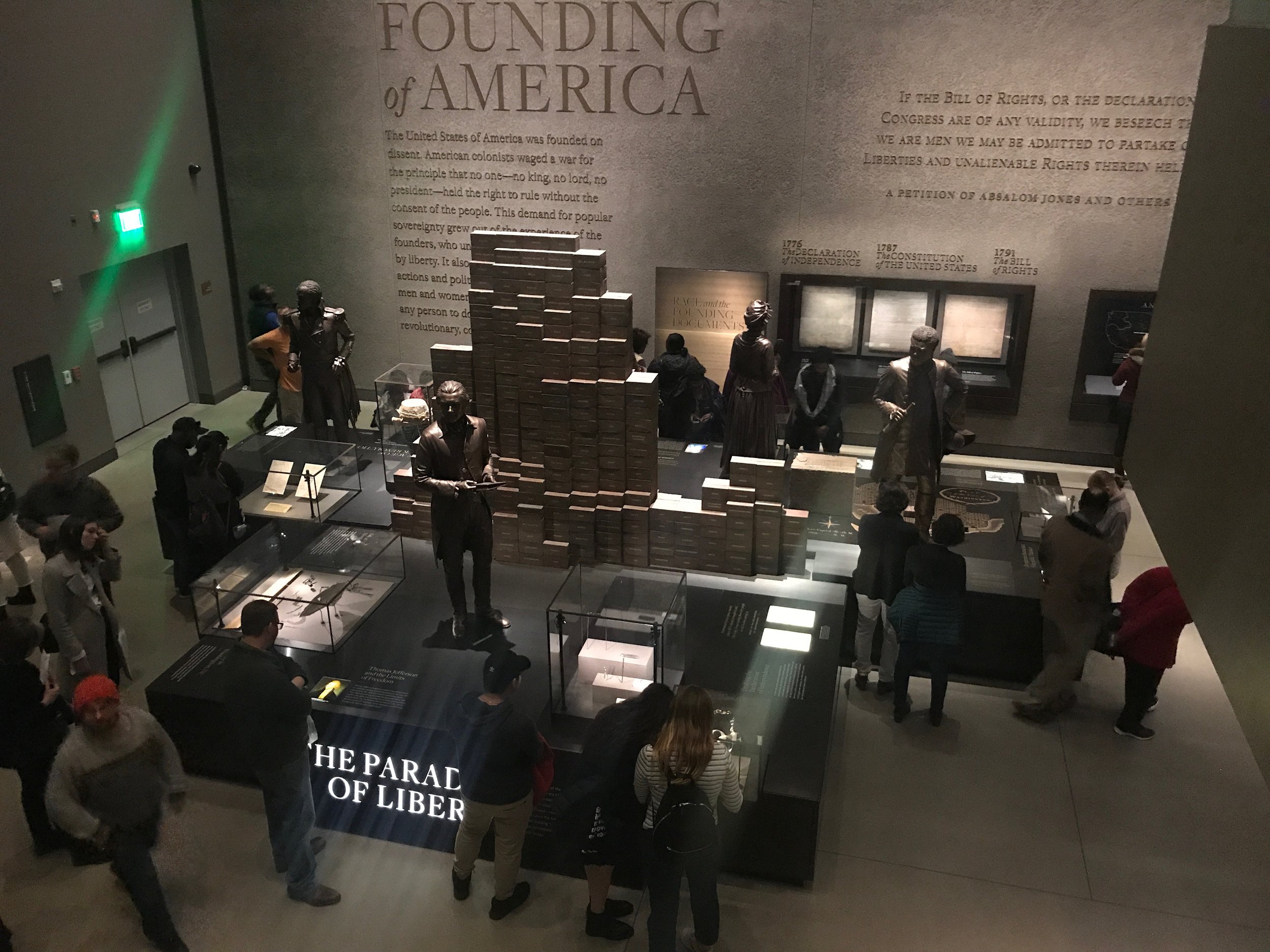  Visitors look over some of the history exhibits at the National Museum of African American History and Culture.      