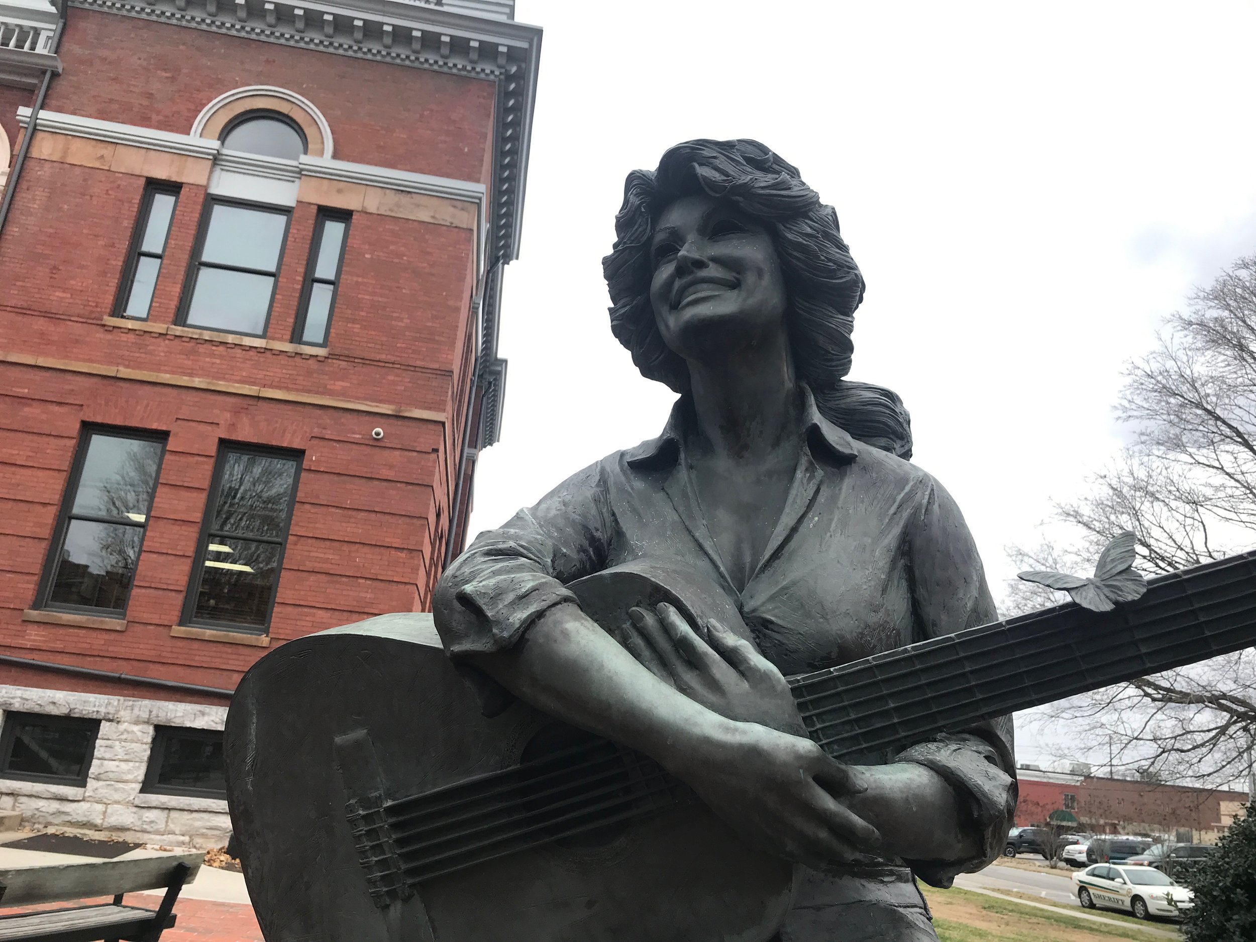  A statue of Dolly Parton, East Tennessee’s favorite daughter, outside the Sevier County Courthouse.      