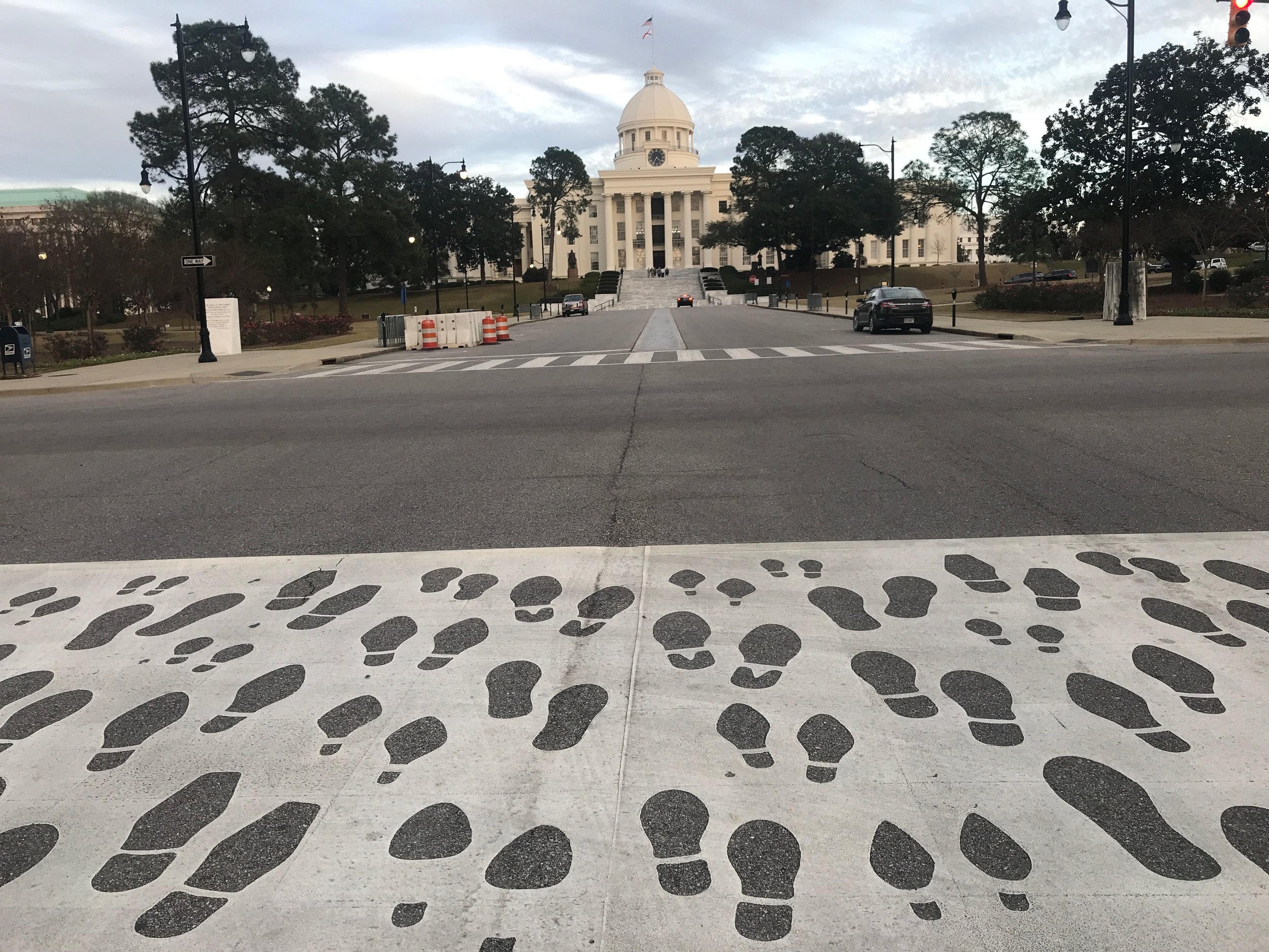 Painted footprints on Dexter Ave. mark the route of the 1965 March for Voting Rights that began in Selma and ended at the foot of the Alabama State Capitol in Montgomery.      