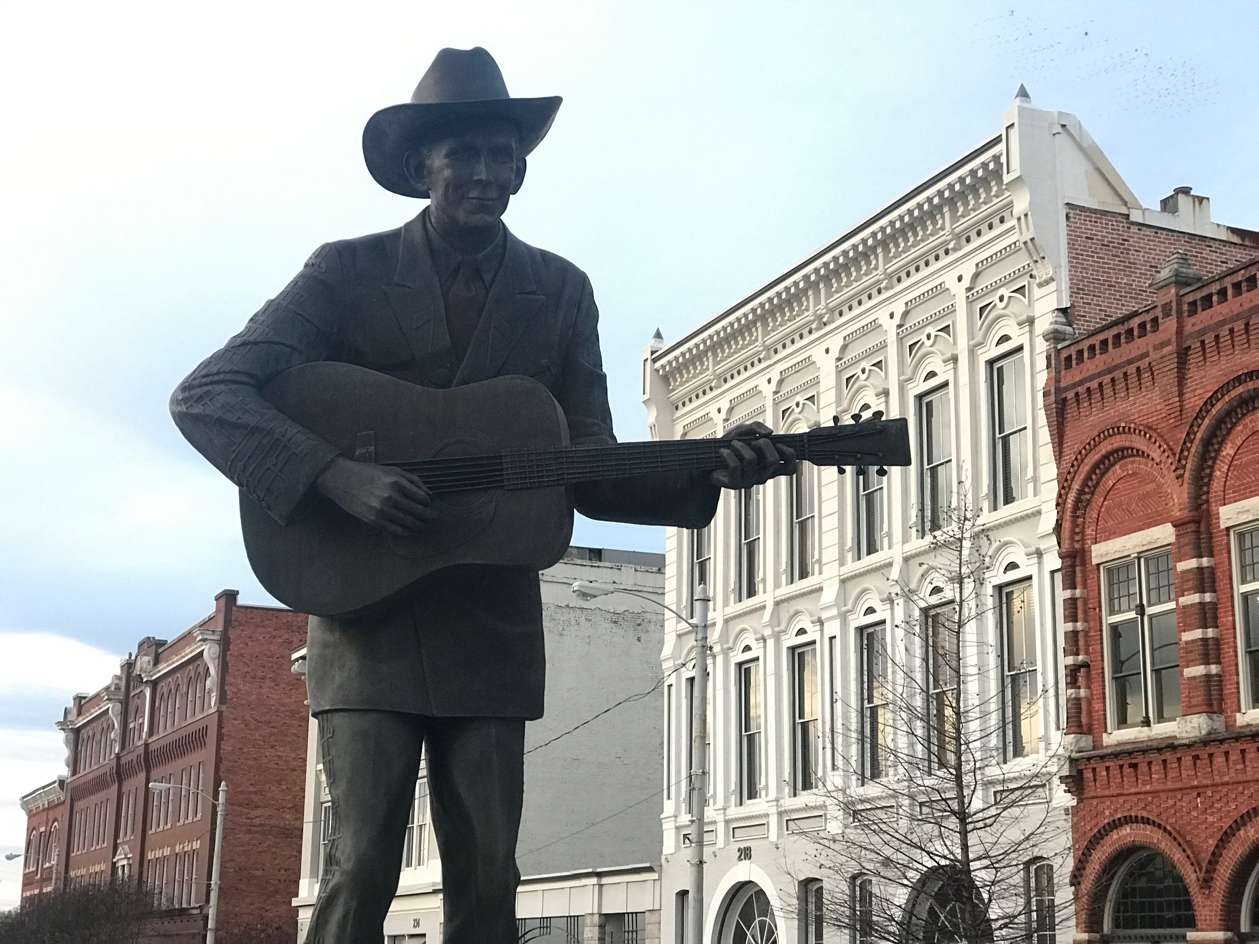 Hank Williams Sr. presides over Commerce Street in Montgomery.