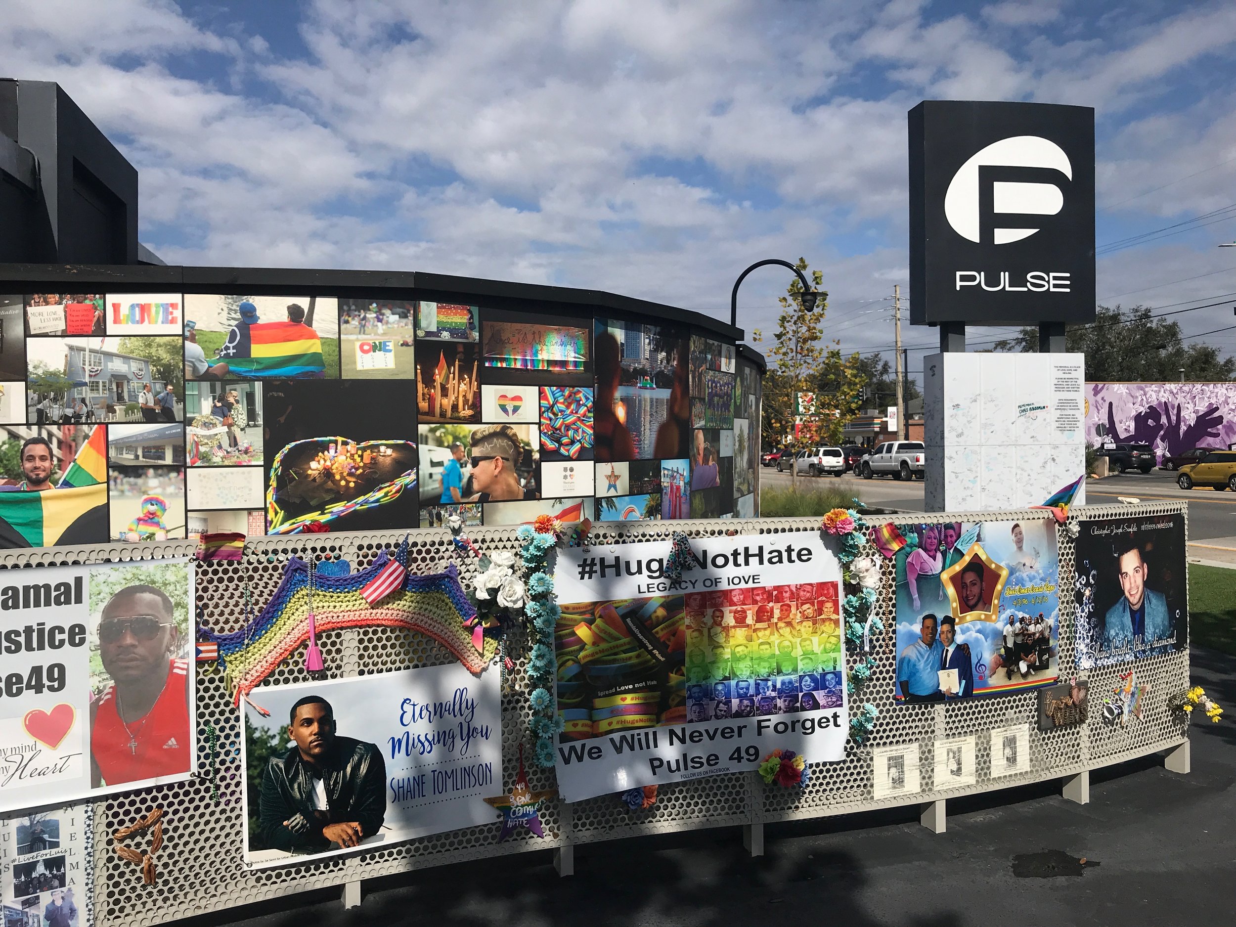  Photos and remembrances of shooting victims cover the wall surrounding the Pulse nightclub in Orlando, Fla., where 49 people were killed in 2016.      