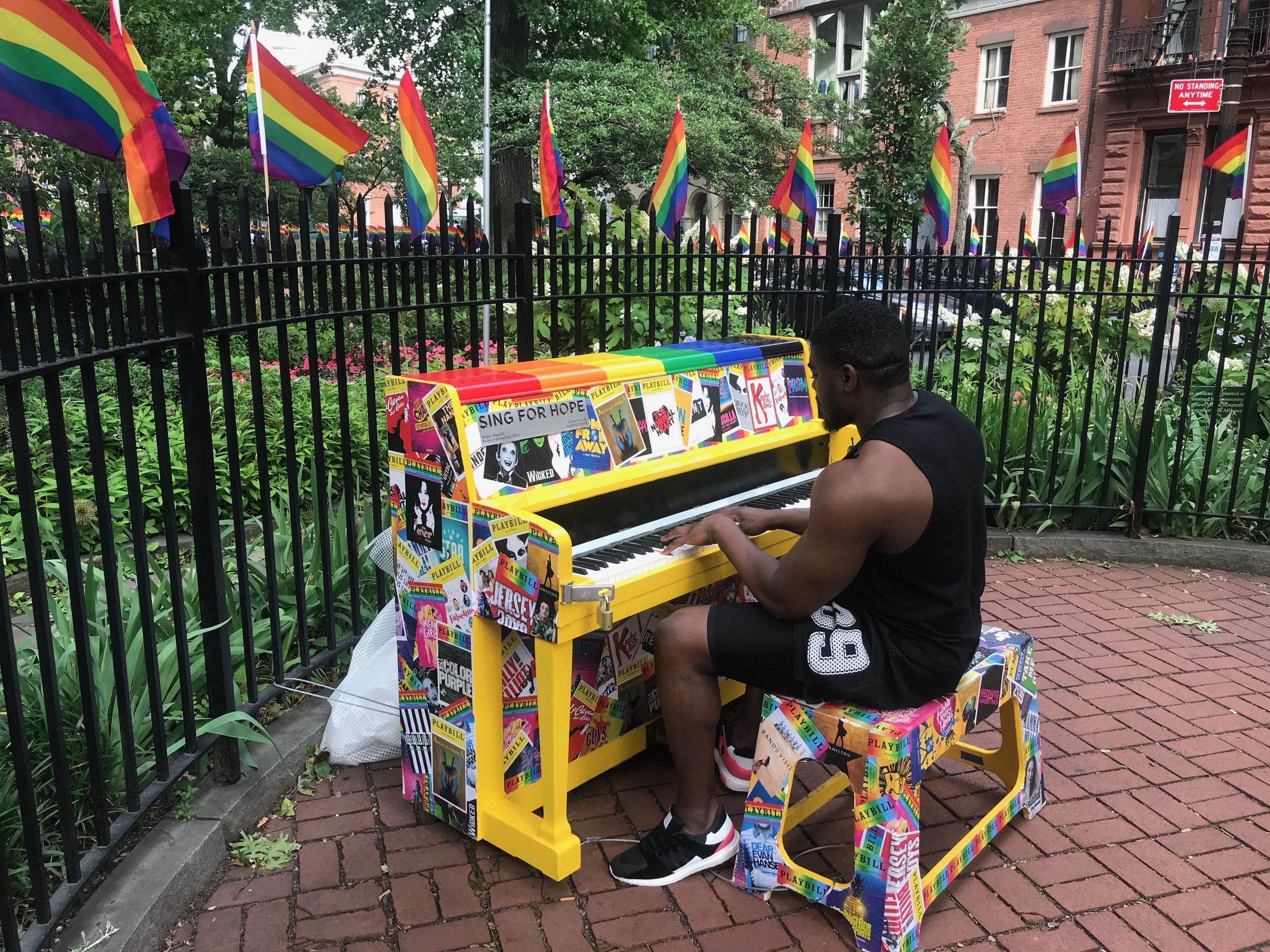  A piano player entertains visitors at Stonewall National Monument, across from the Stonewall Inn in New York's Greenwich Village. 