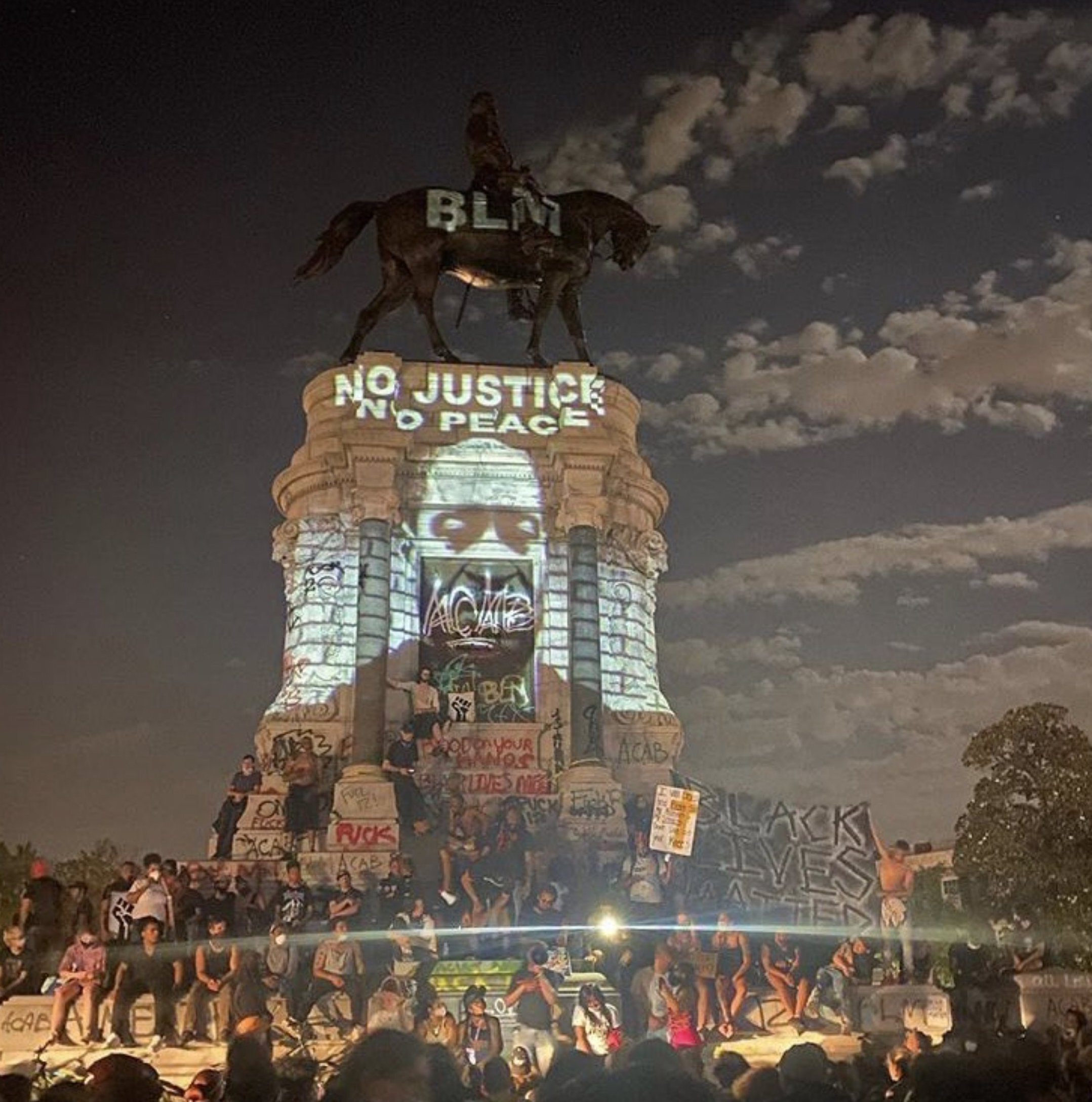  In the last few weeks, the statue of Robert E. Lee that towers over Richmond’s Monument Avenue has become an unlikely site for celebrating Black lives. (Uncredited photo via Twitter) 