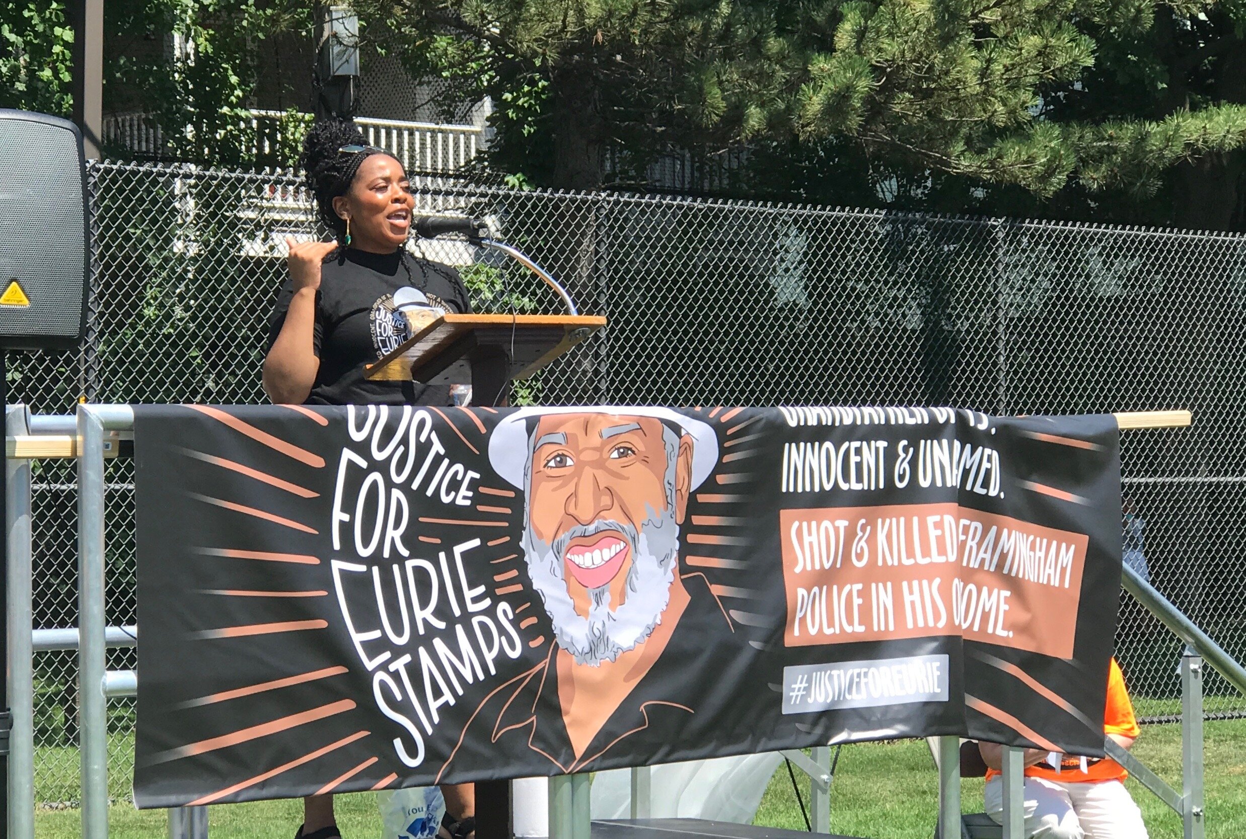  Moriah Wilkins, granddaughter of Eurie Stamps, addresses supporters at Hoyt Field in Cambridge. 