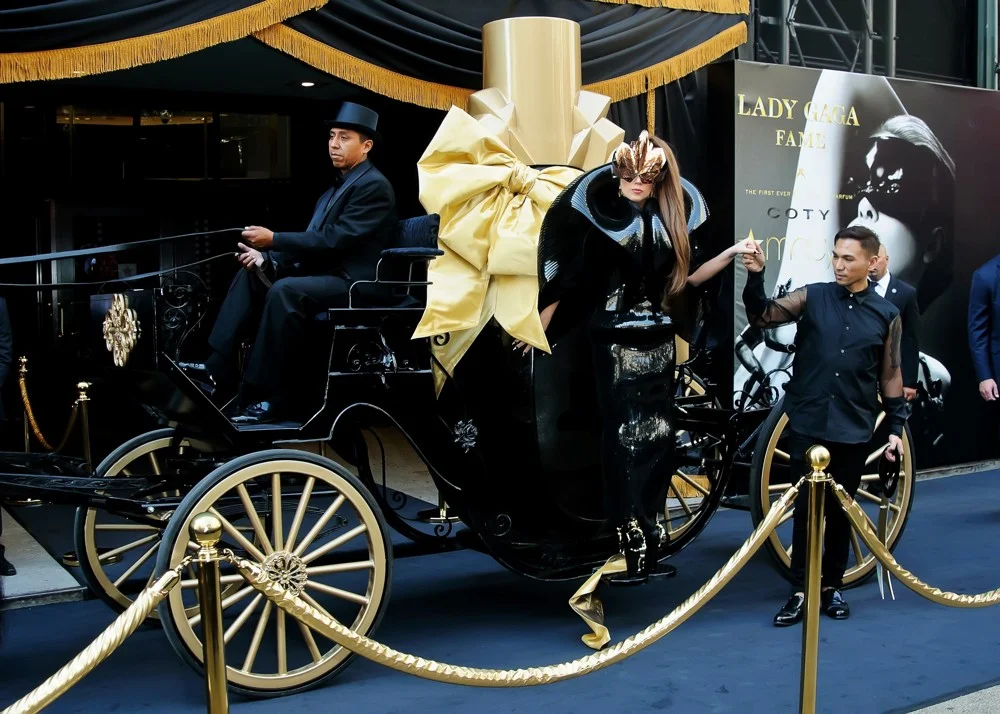 Lady Gaga in perfume bottle.jpg