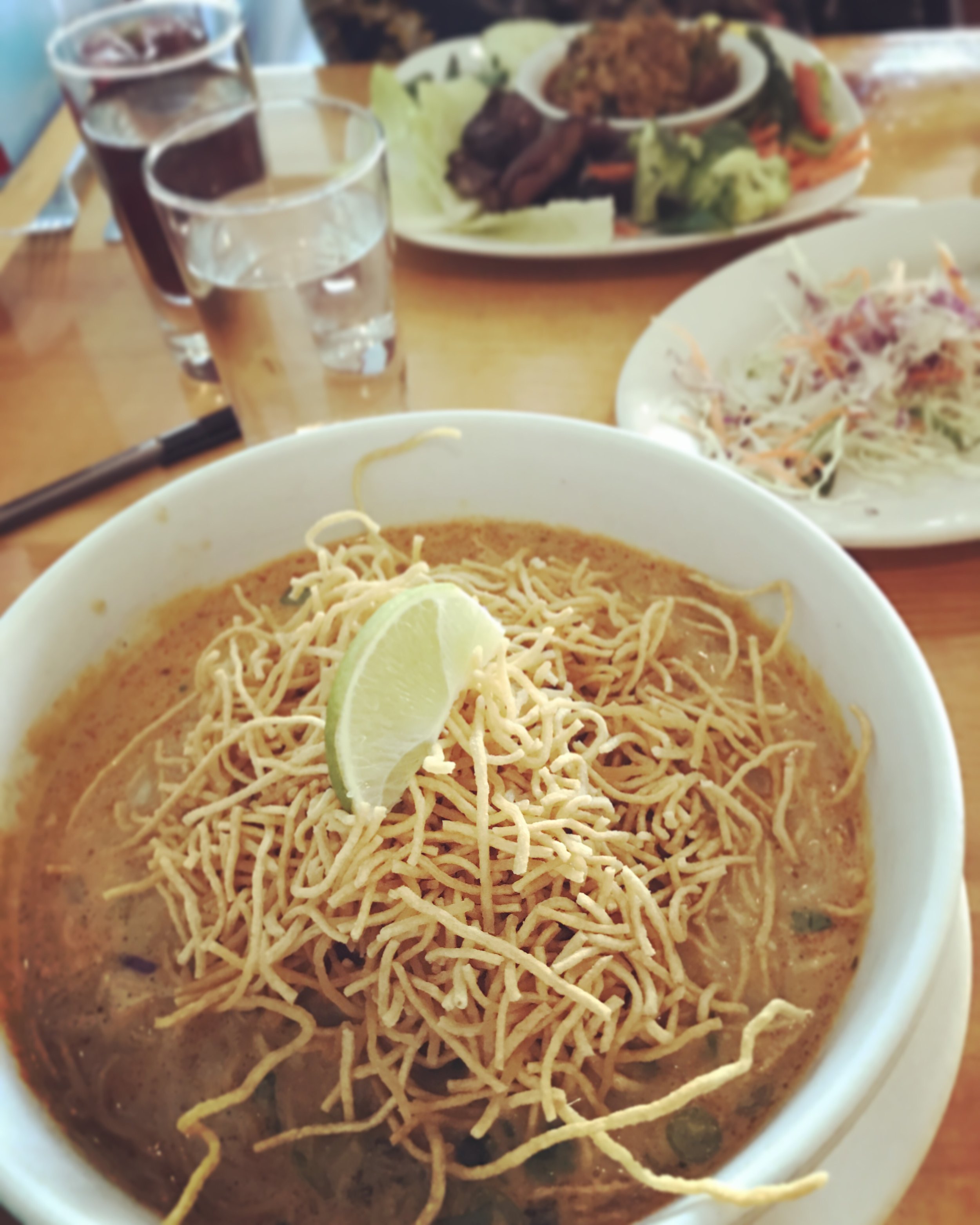 Khao Soi: Curried Chiang Mai egg noodle dish with beef, cilantro, pickled mustard greens and shallots.