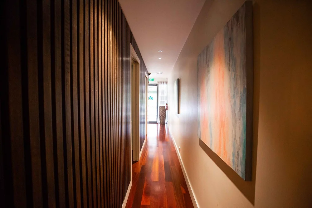 Polished floorboards in hallway