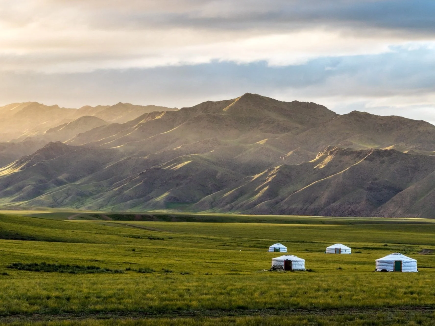 Mongolia landscape with traditional yurts