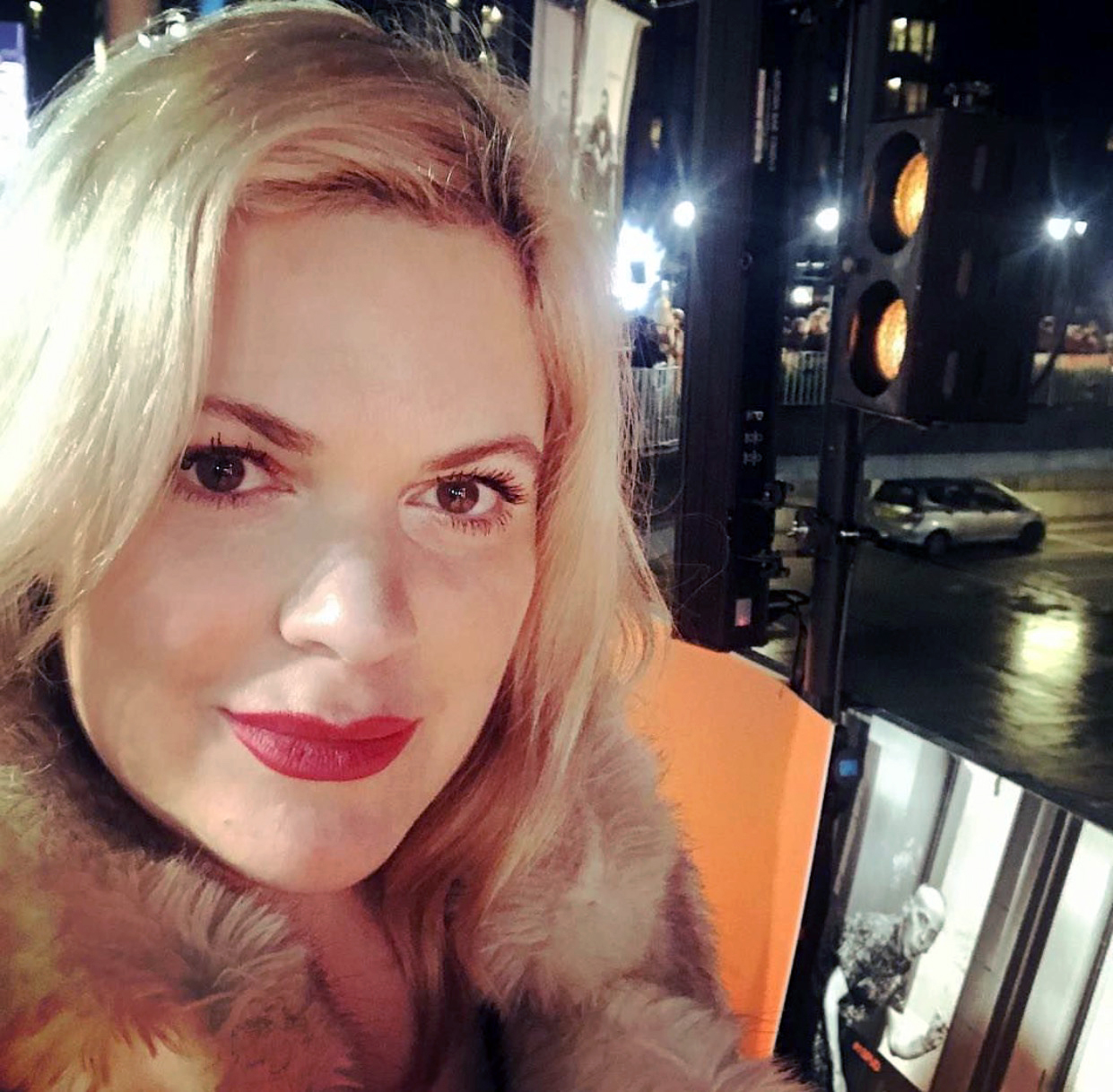 Waving hello from my recent press tour! Love this lipstick? Watch my Red Velvet Lip Tutorial here! 