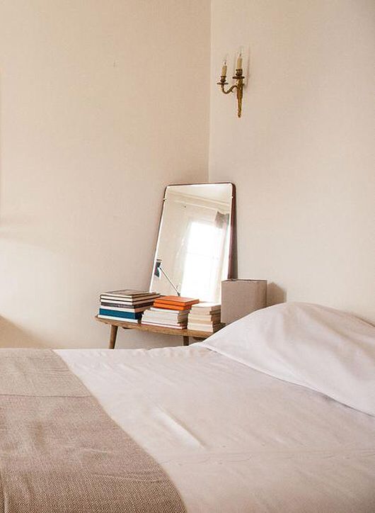 Falling asleep next to a stack of books.