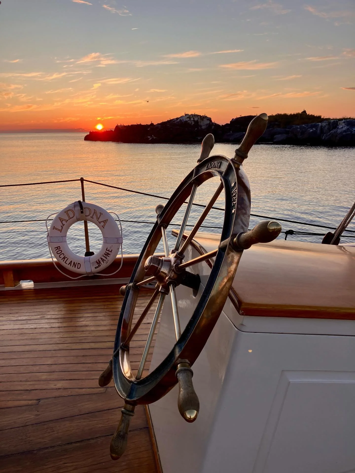 It&rsquo;s not too late to put your 2026 Ladona trip on your Christmas list! Our season schedule is posted and you can find the link in our bio, so be sure to check it out! Pictured here is one amazing sunset last summer from Monhegan Island. 
#schoo