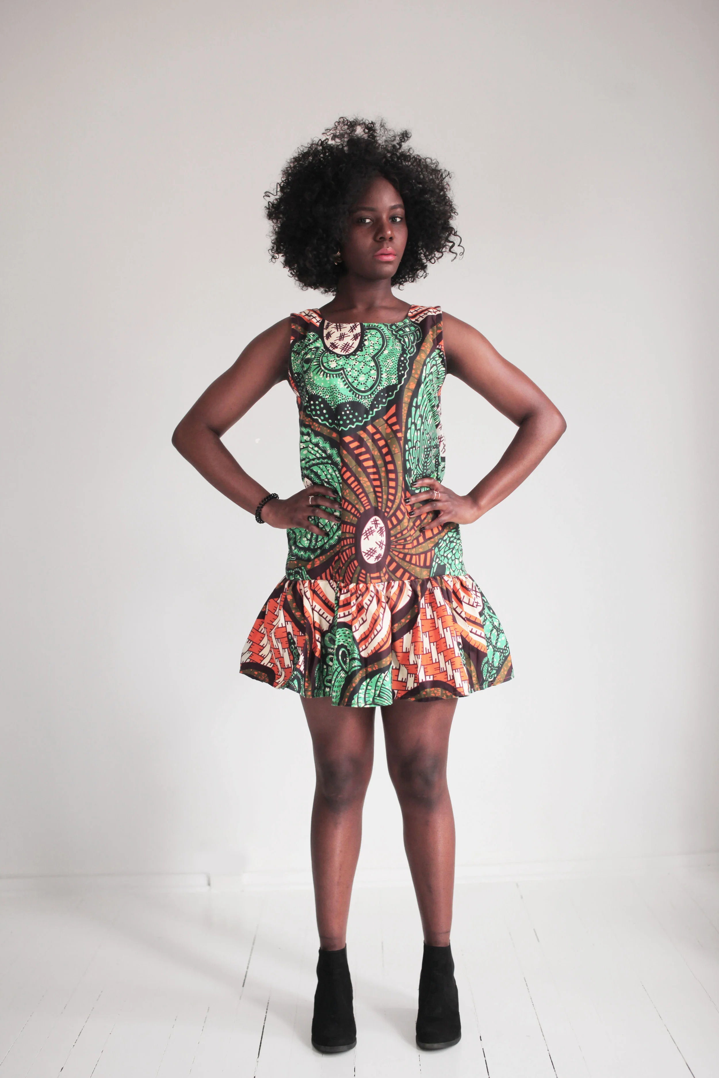 miss amina green and orange.jpg