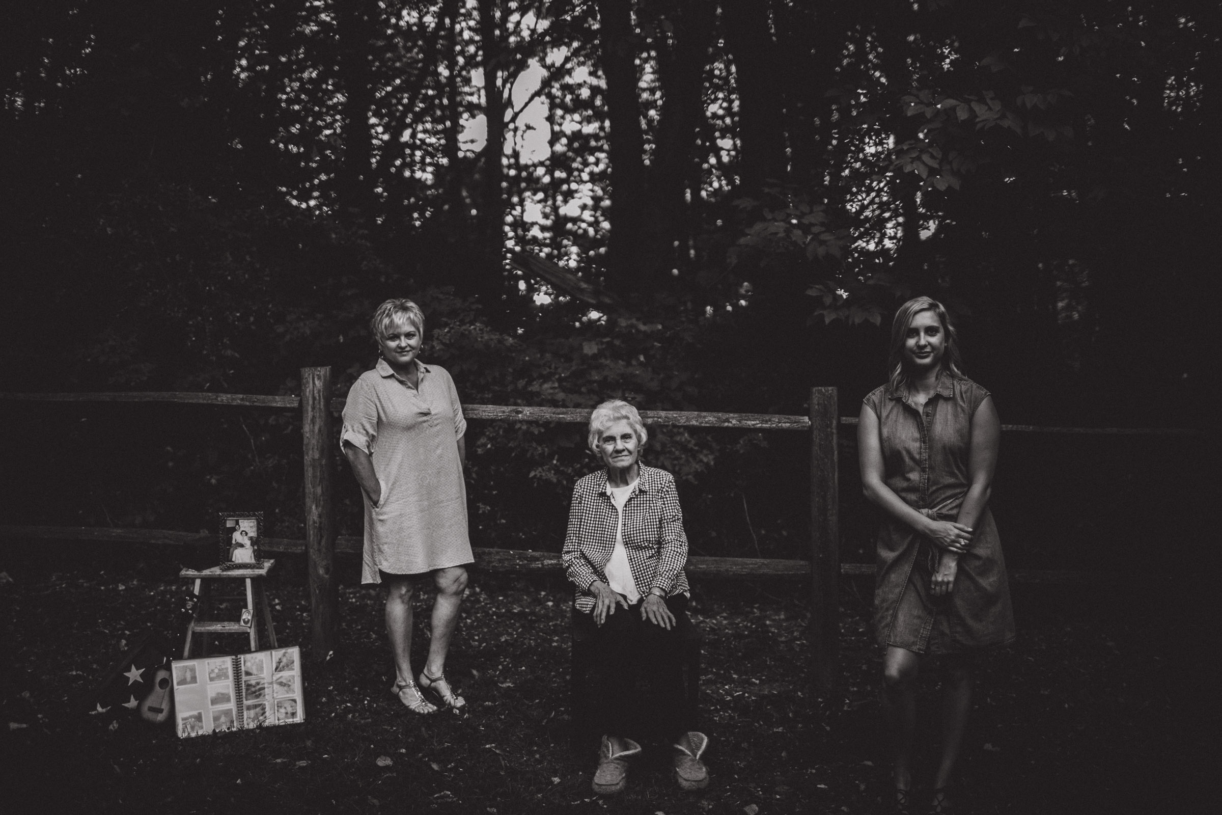 3 women standing in strength, black and white 