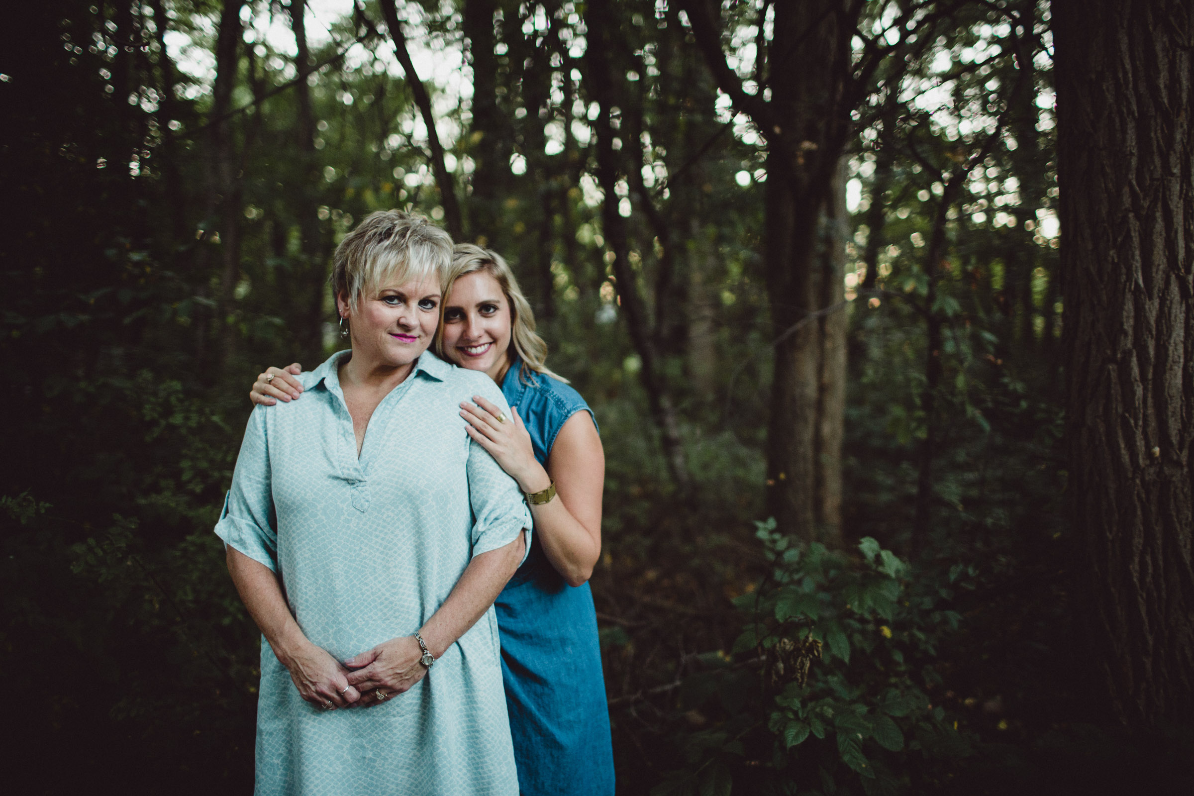 mother and daughter portrait in woods 