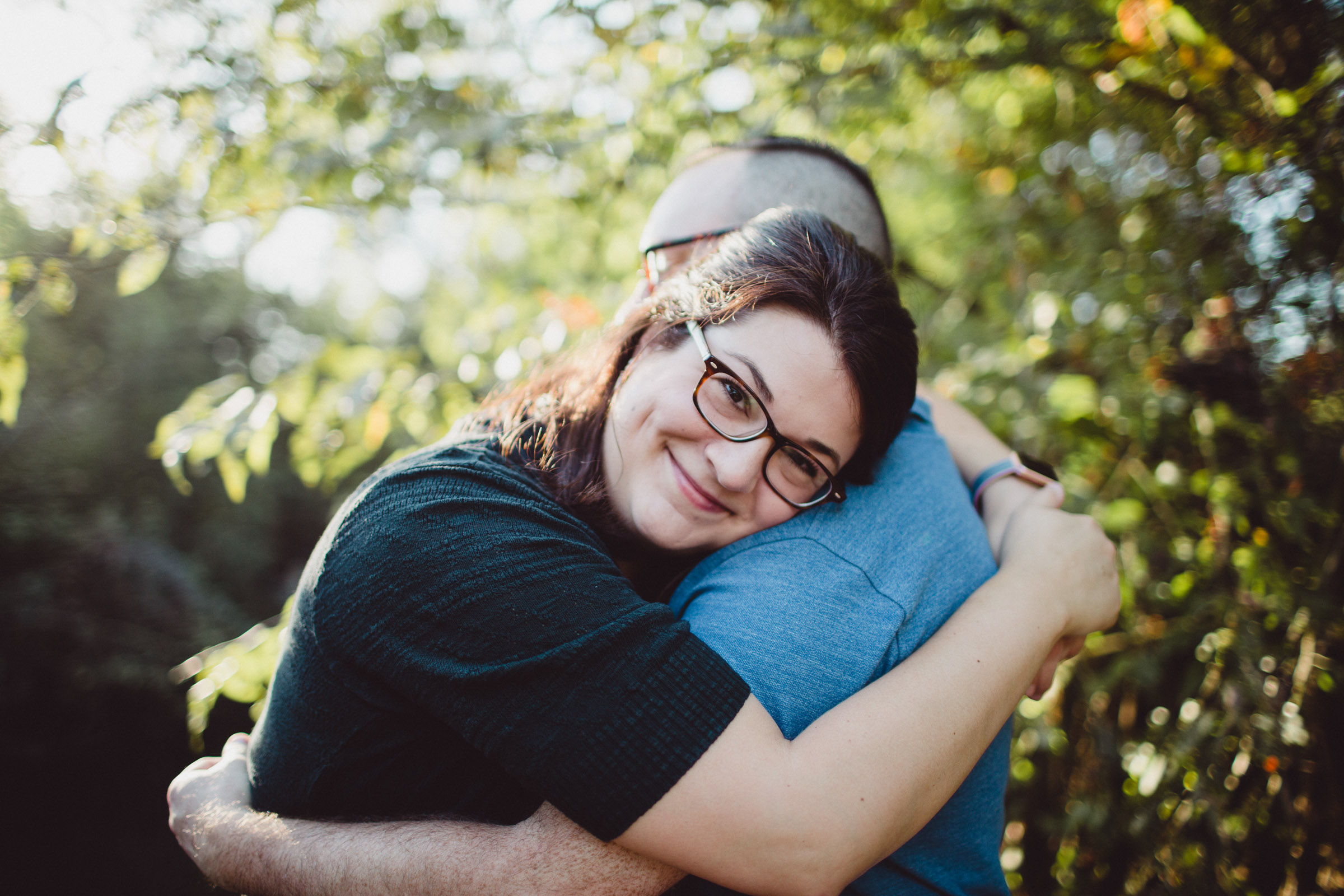 wife resting on husband's shoulder 