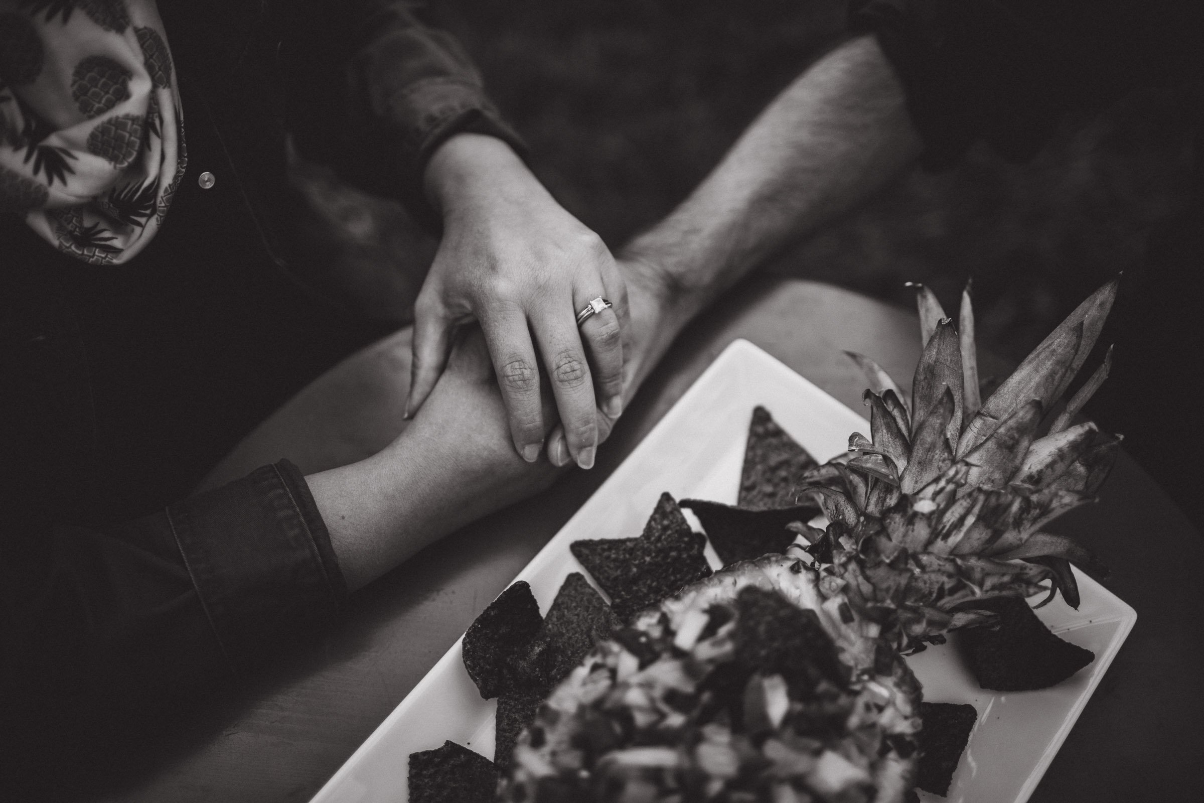 couple eating at a table black and white portrait 