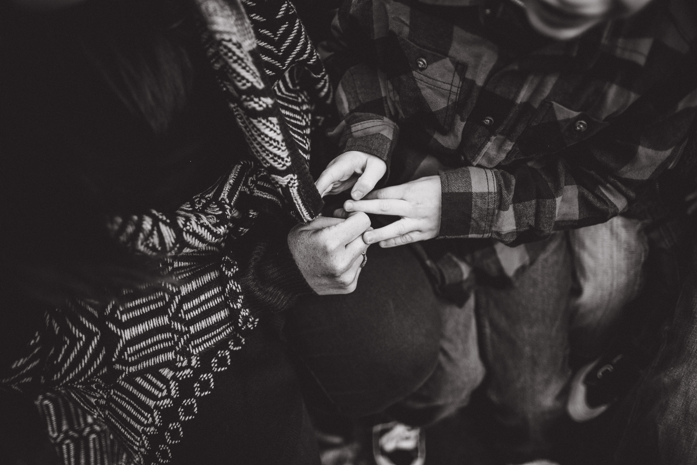 Mother and son holding hands; black and white portrait 