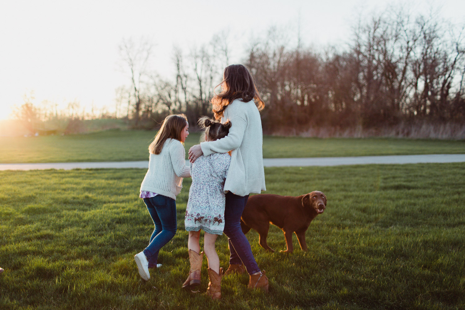 family gathered together with dog