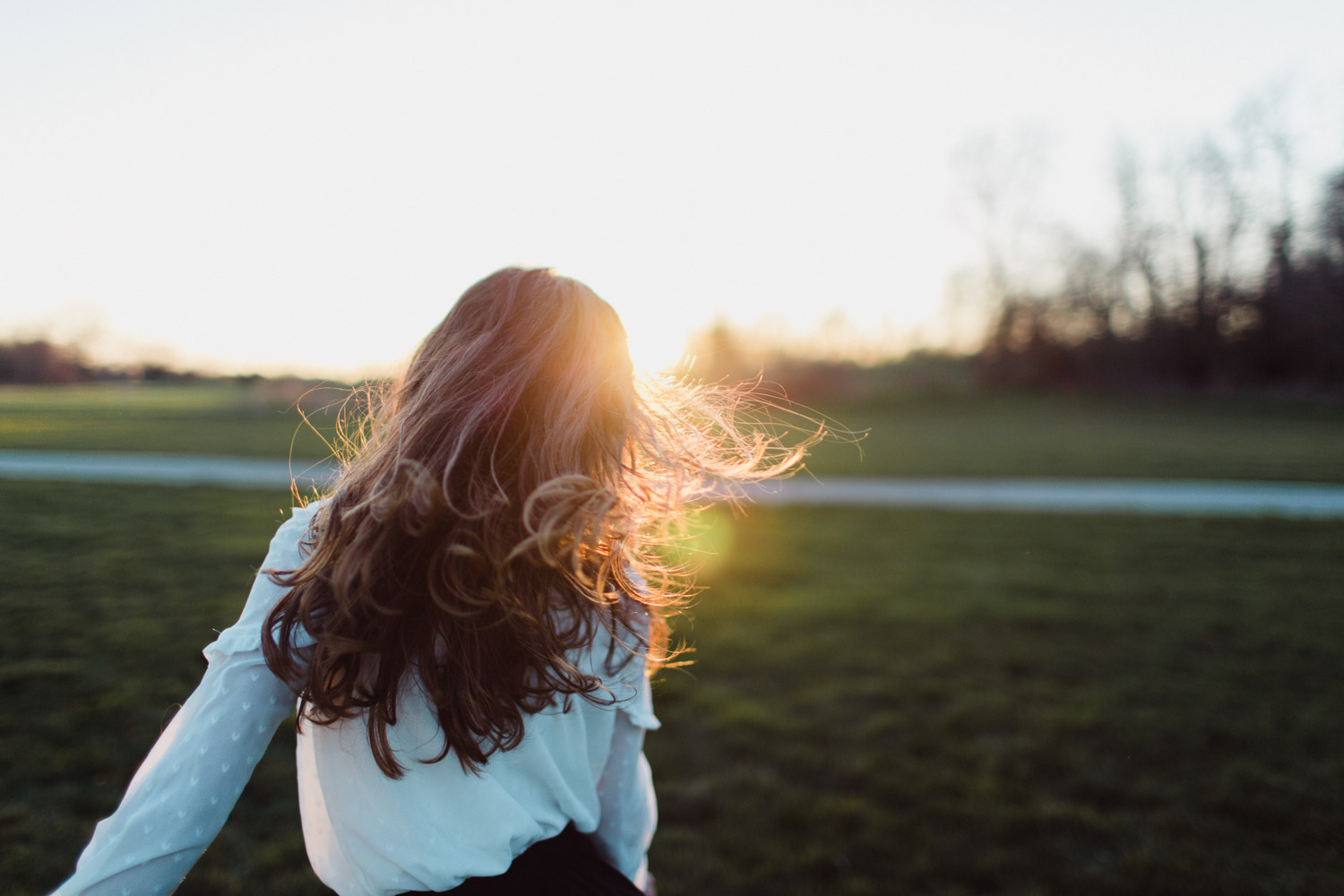 Girl twirling hair 