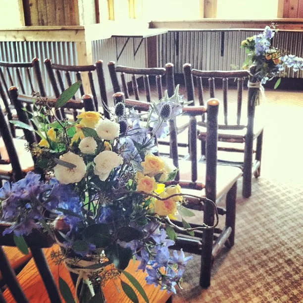 We tied these on chairs at the back up location inside, but the rain is clearing. Keep fingers crossed.