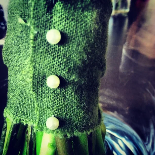 Dark green fabric in the bridesmaid bouquets for a another wedding this afternoon.