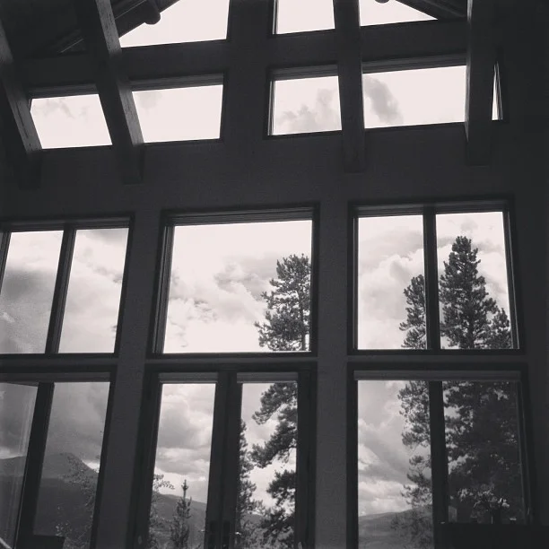 Floor to ceiling south-facing windows in this private home. It's pretty sweet.