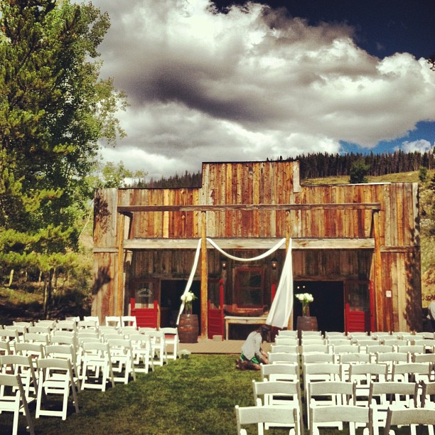 Ceremony in front of an old saloon. // #breckwedding #venue